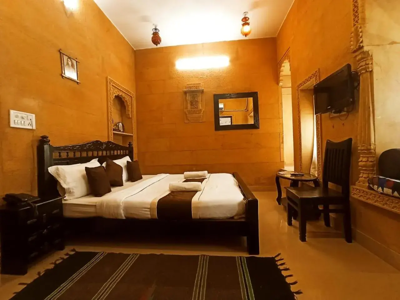 Bed in Hotel Royal Haveli