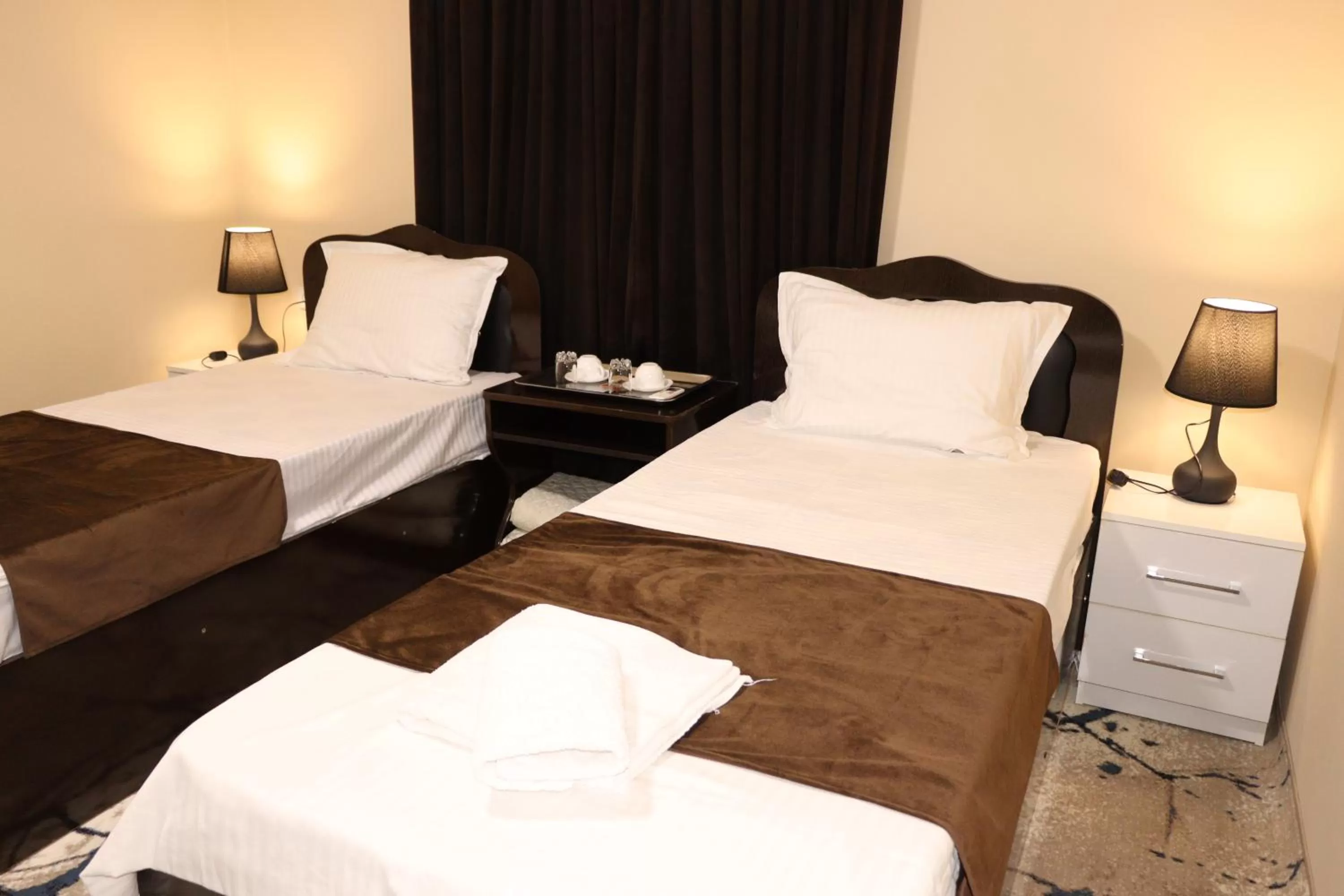 Bed in Al Bukhari Boutique Hotel