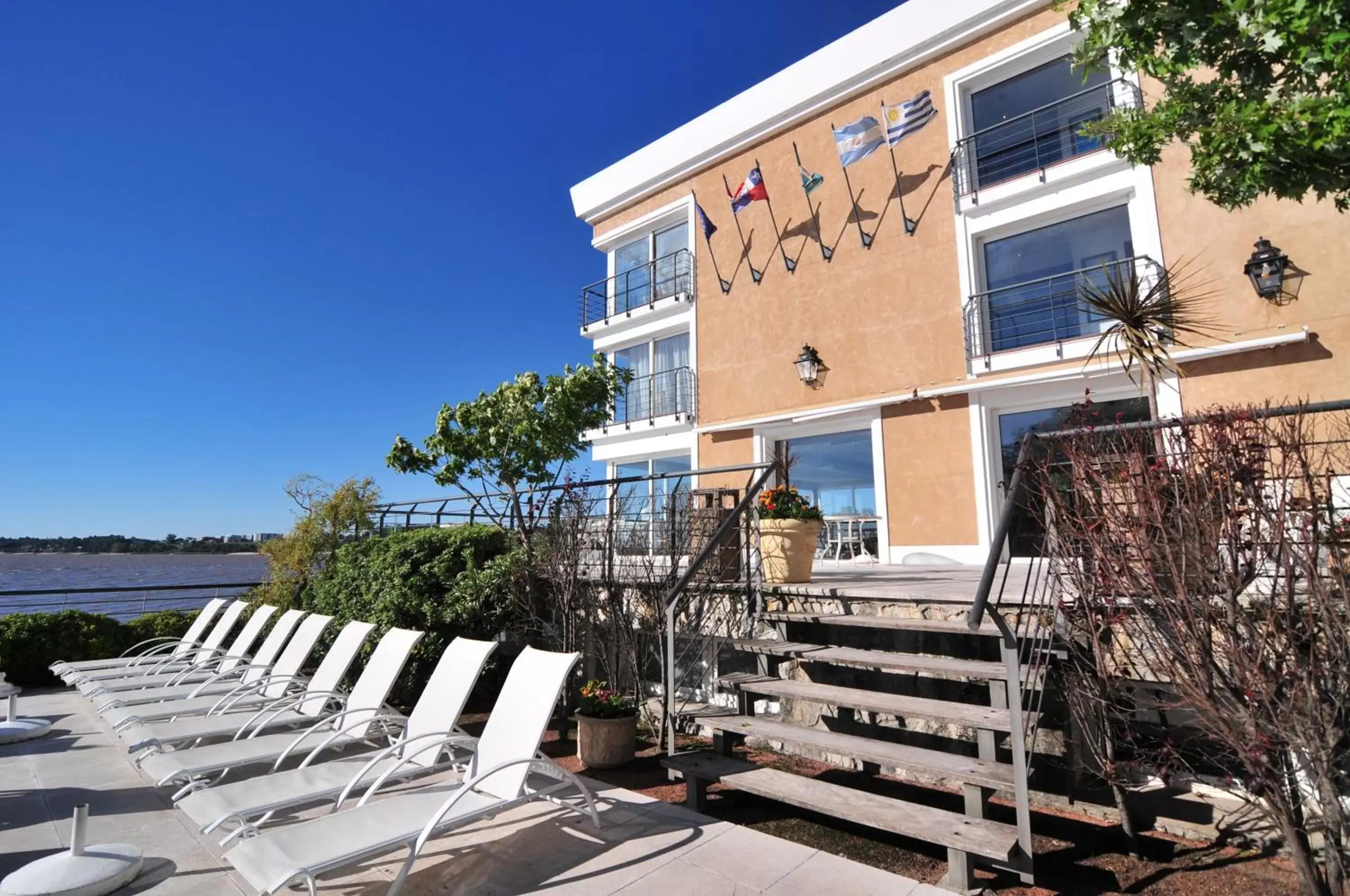 Swimming pool, Property Building in Radisson Colonia Del Sacramento Hotel