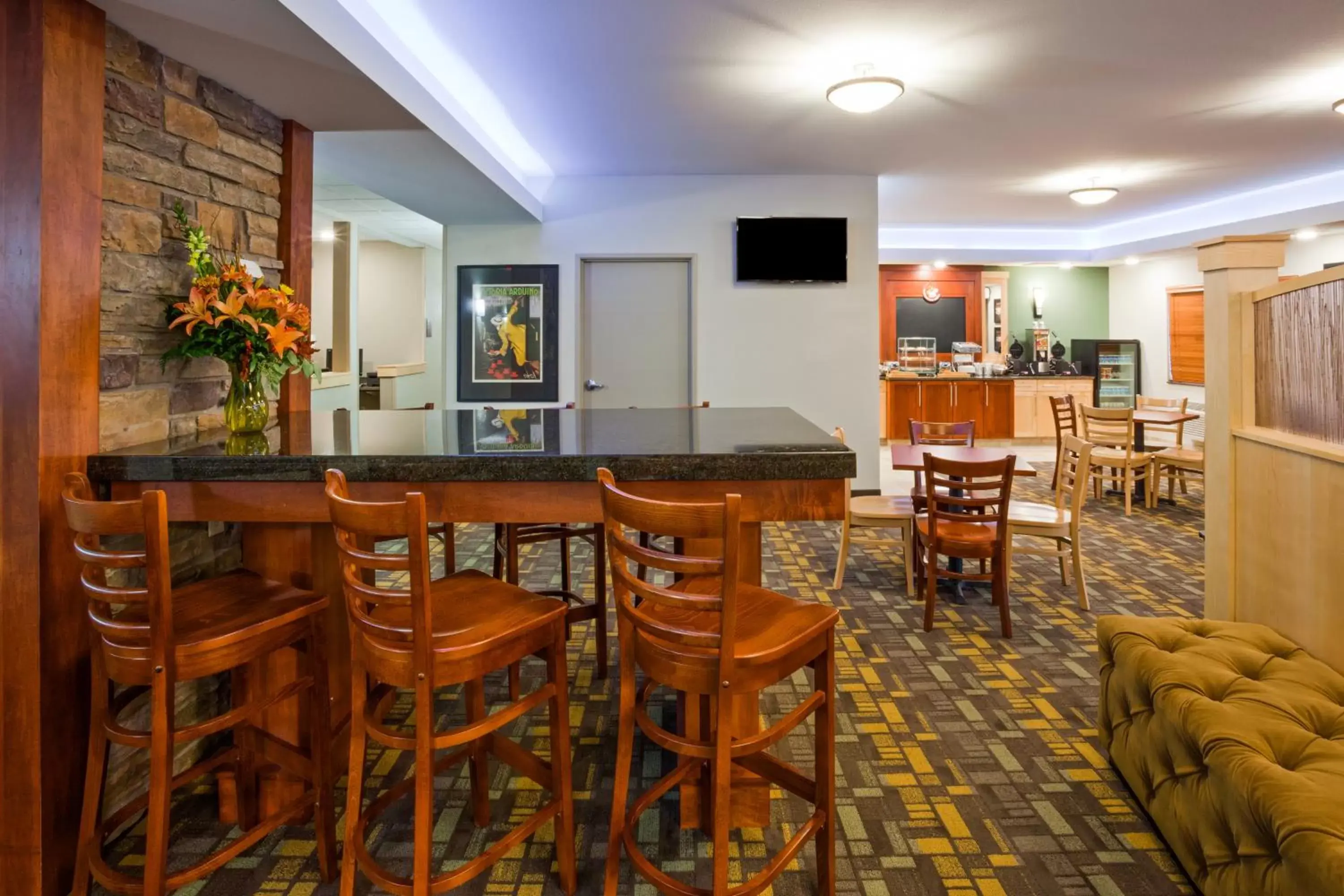 Lobby or reception, Lounge/Bar in AmericInn by Wyndham Sibley