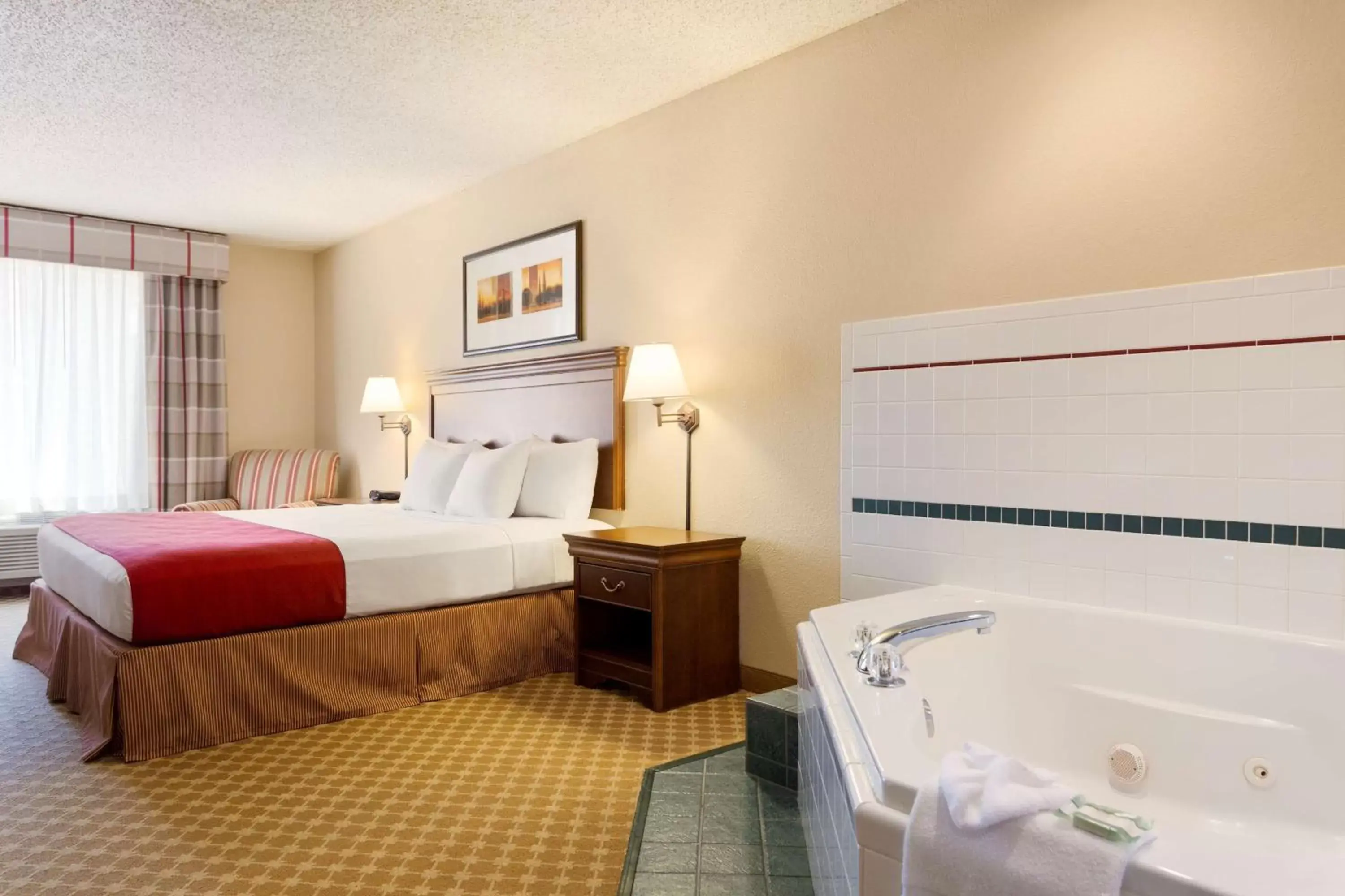 Photo of the whole room, Bed in Country Inn & Suites by Radisson, Nevada, MO