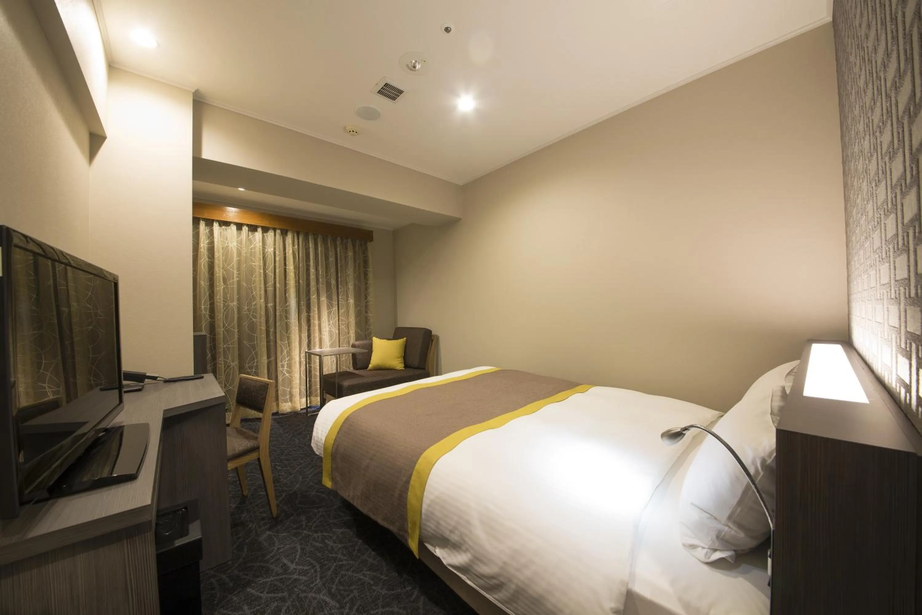 Decorative detail, Bed in Almont Inn Tokyo Nihonbashi