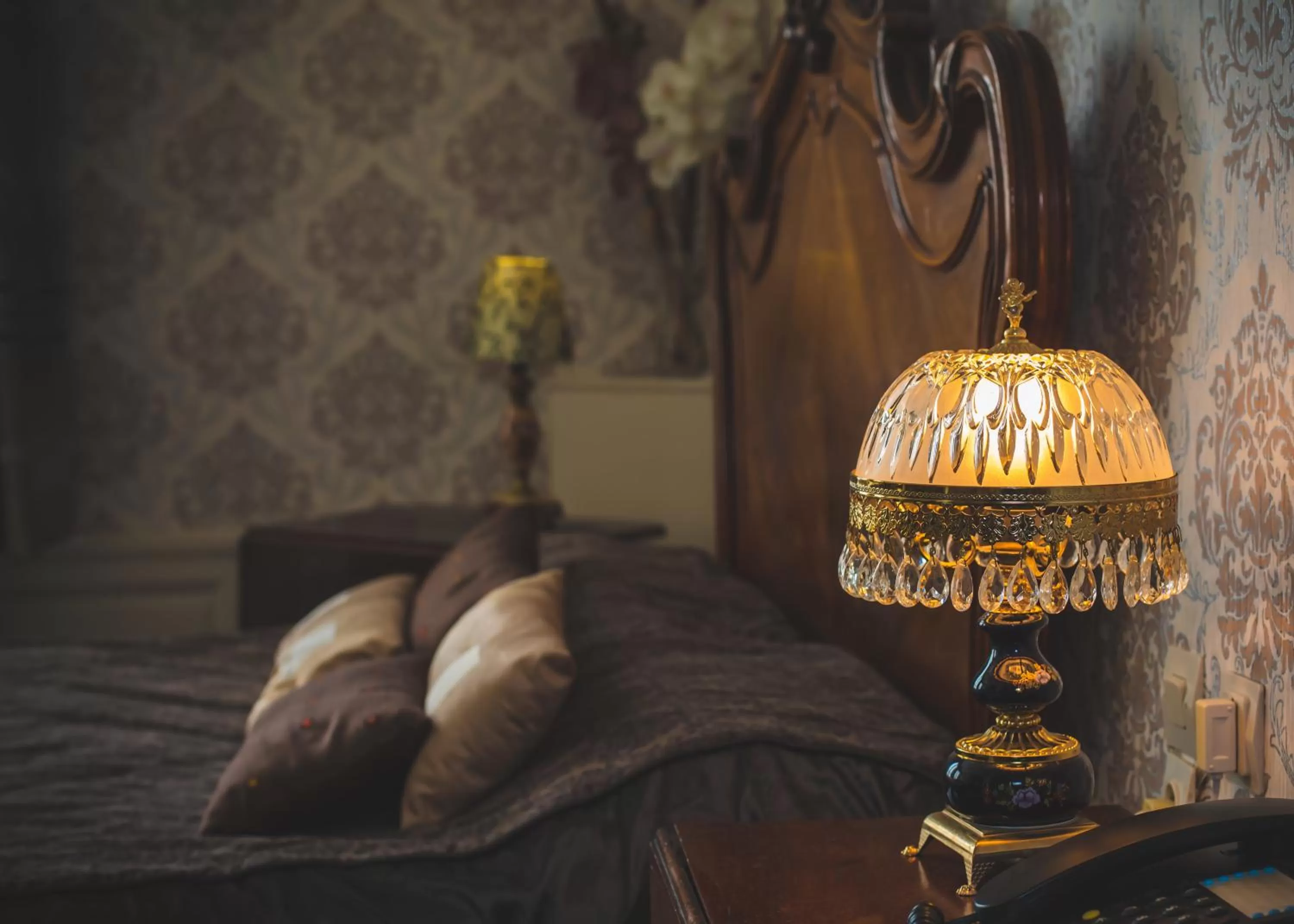 Bed in Hôtel De La Banniere De France