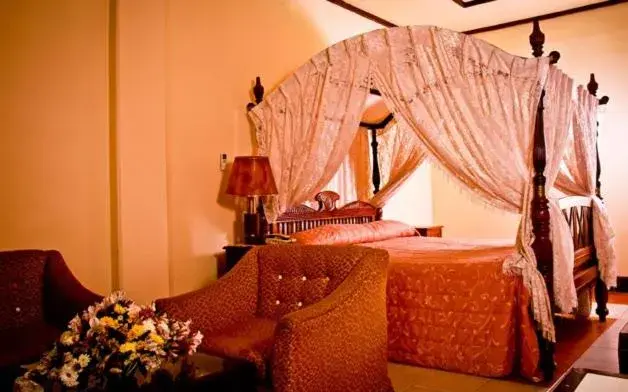 Bed in Grand Oriental Hotel