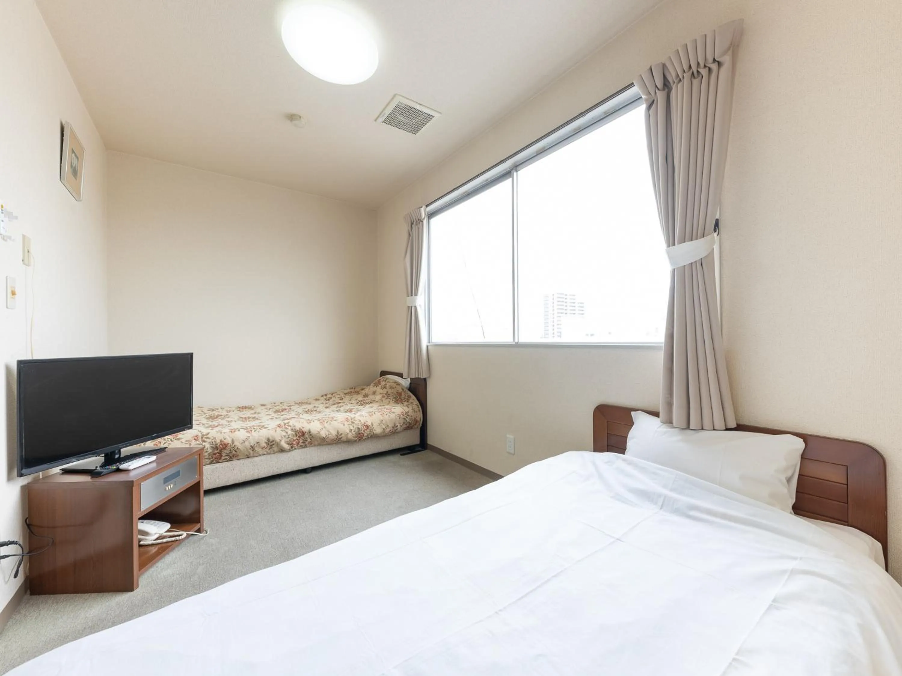 Photo of the whole room, Bed in Tabist Tatebayashi Station Hotel