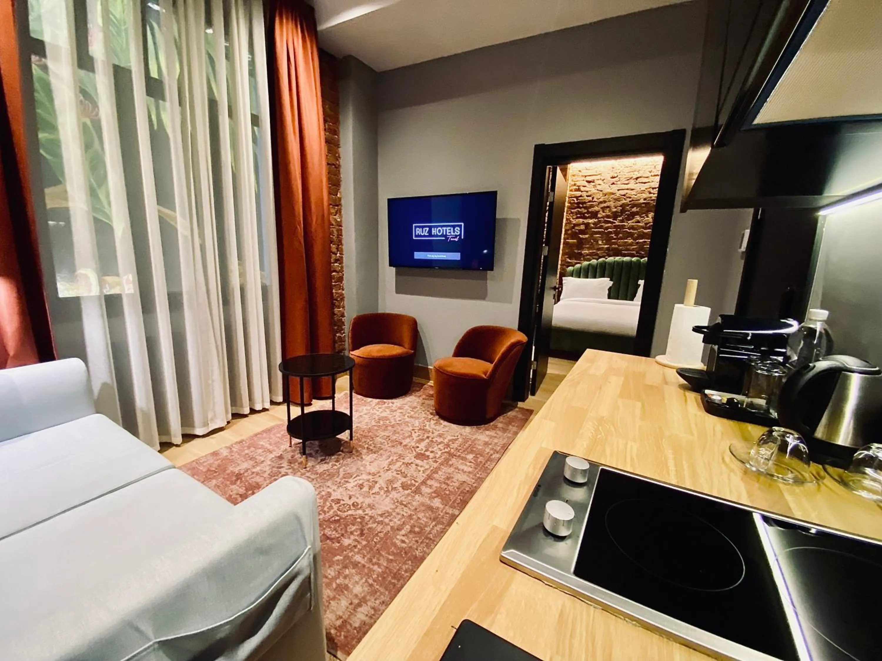 kitchen, Bed in RUZ Hotels