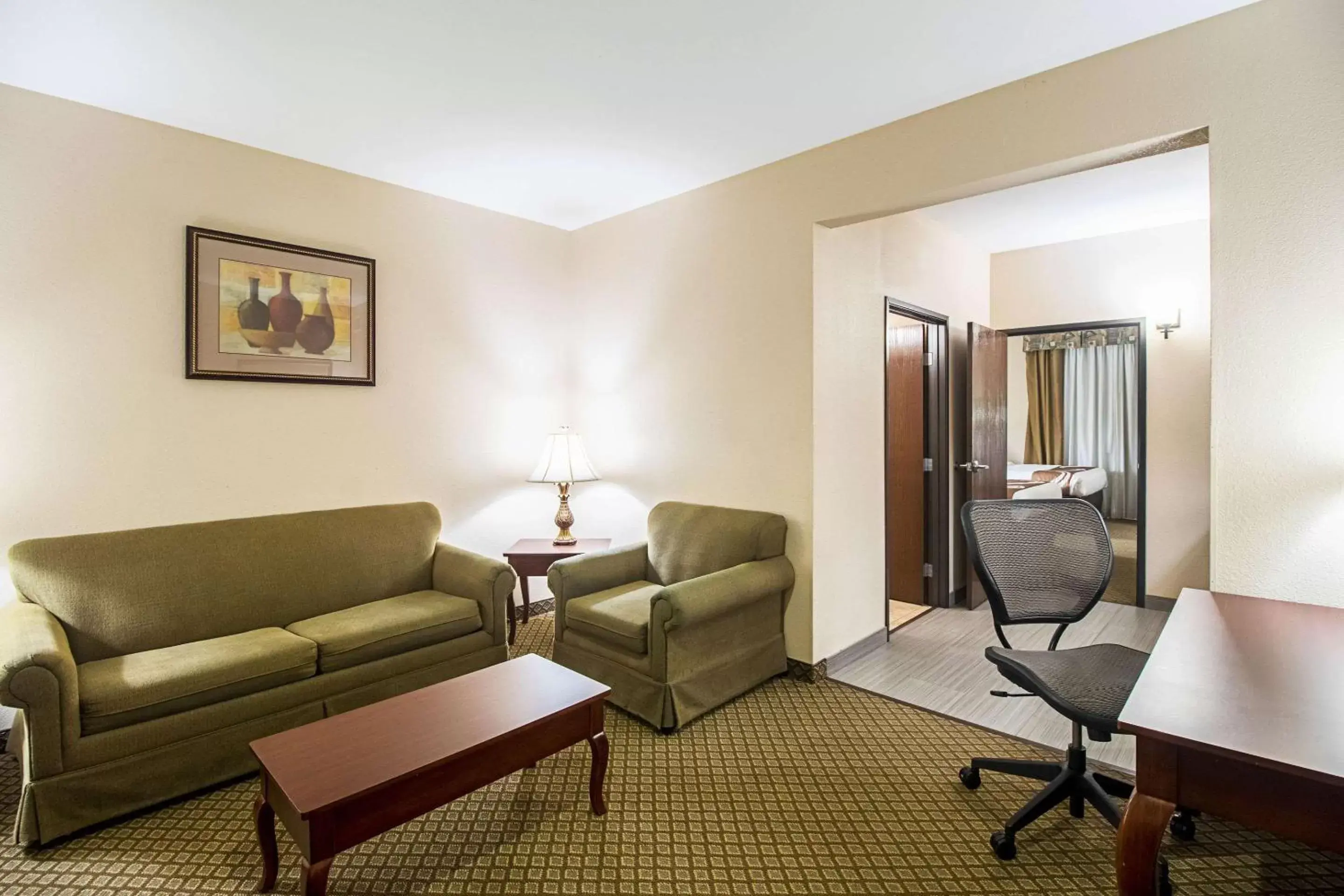Bedroom, Seating Area in Quality Inn & Suites