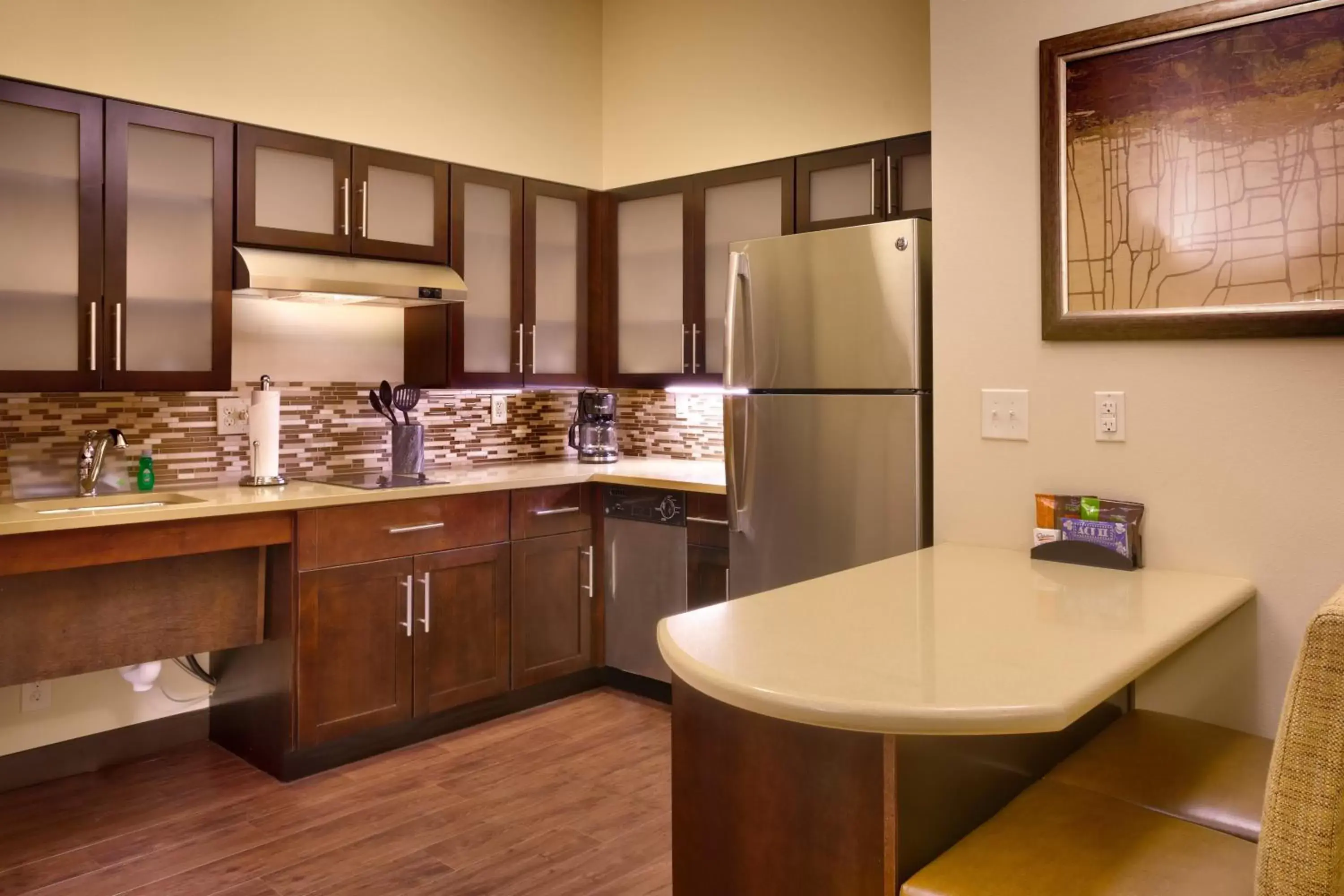 Photo of the whole room, Kitchen/Kitchenette in Staybridge Suites Cheyenne, an IHG Hotel