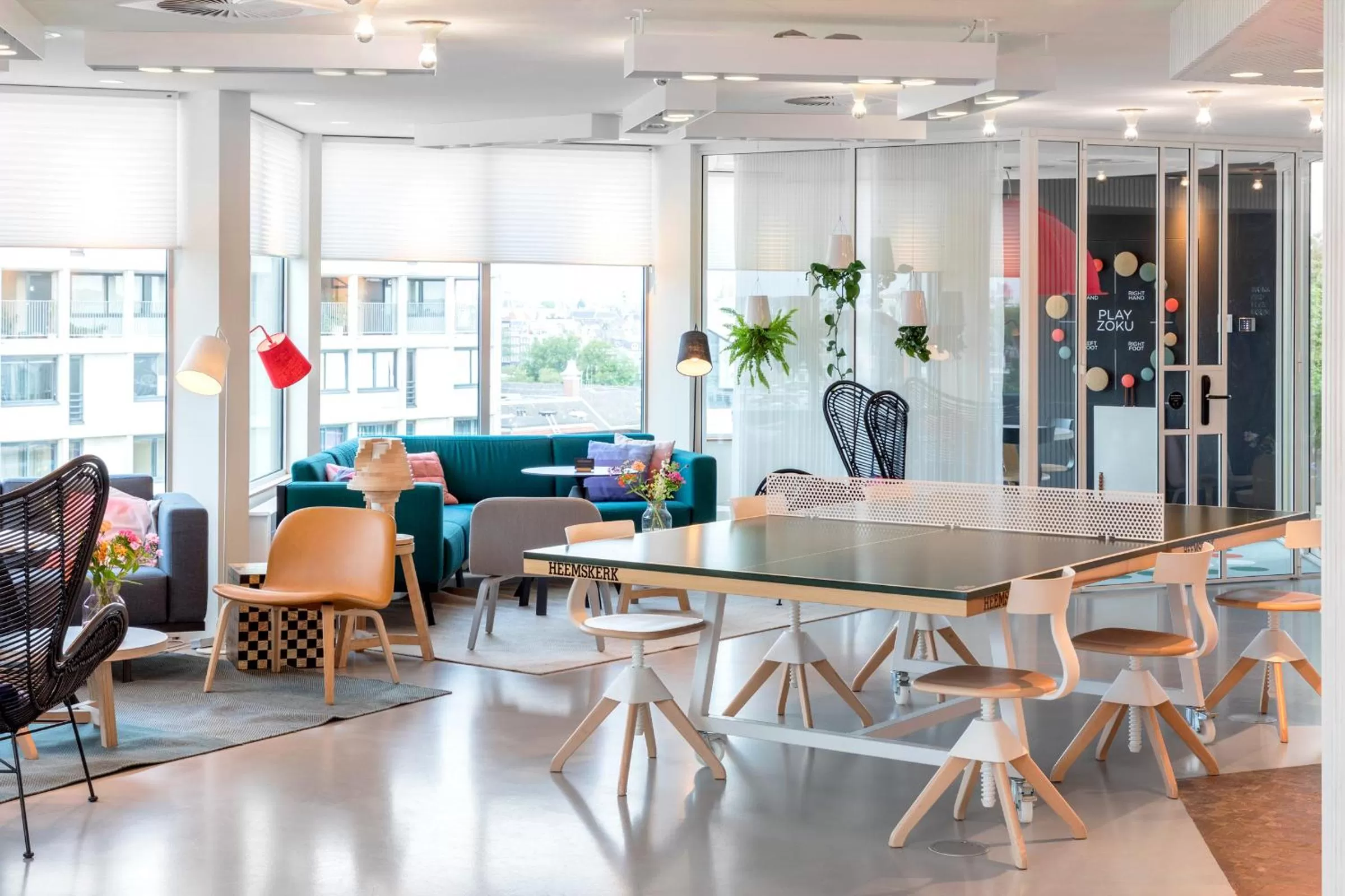 Communal lounge/ TV room in Zoku Amsterdam