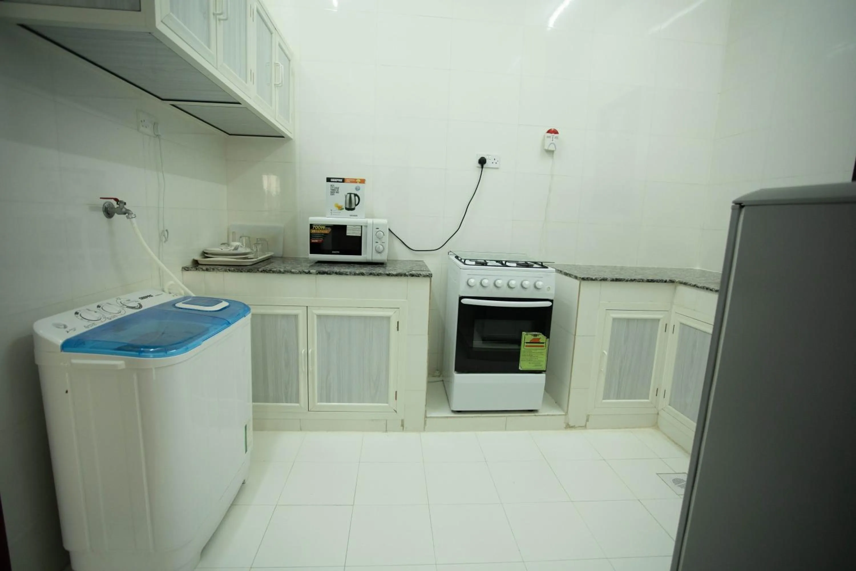 Kitchen/Kitchenette in Star Emirates Furnished Apartment