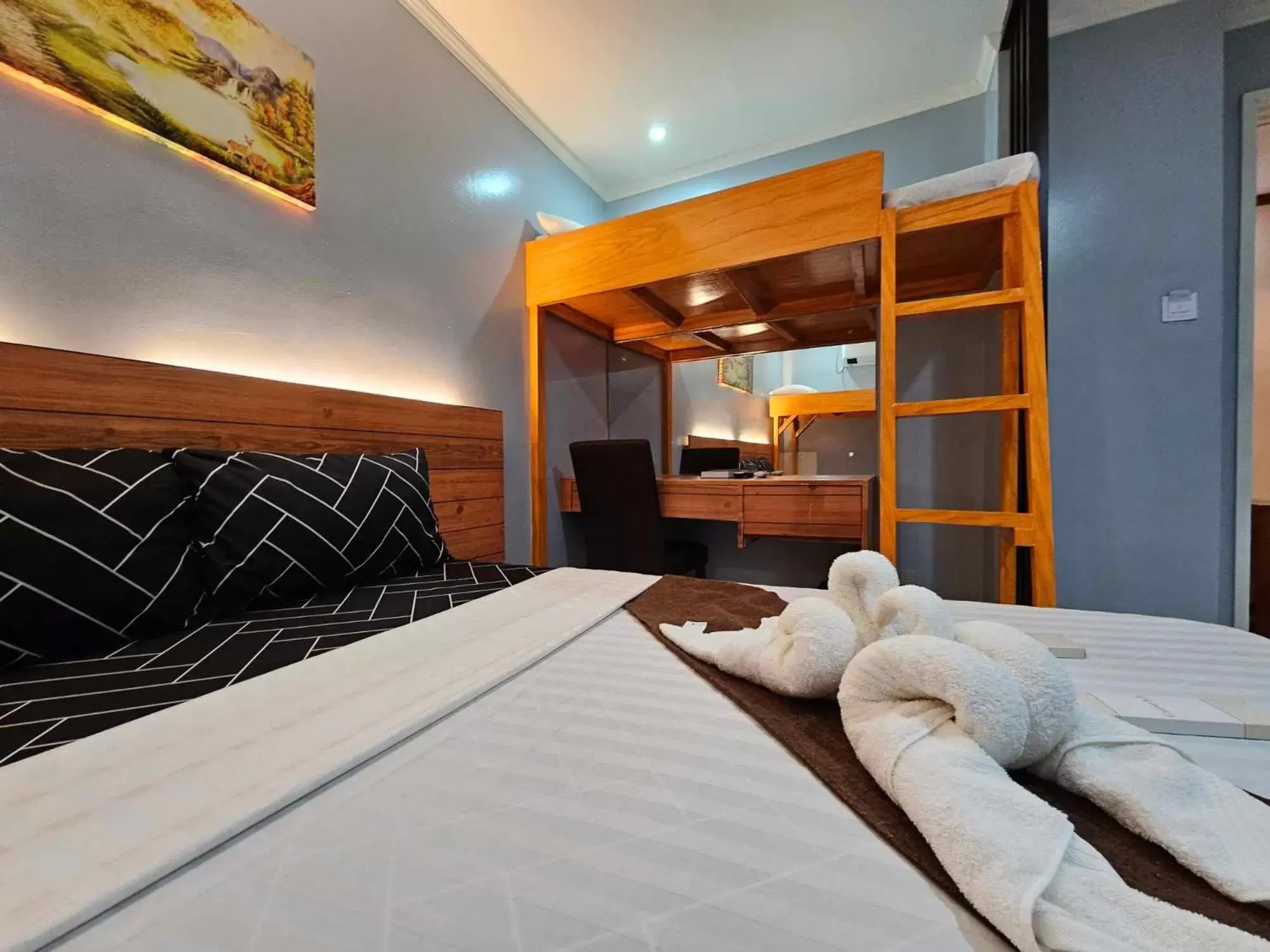 Bed in La Choeben Suites Bed in La Choeben Suites