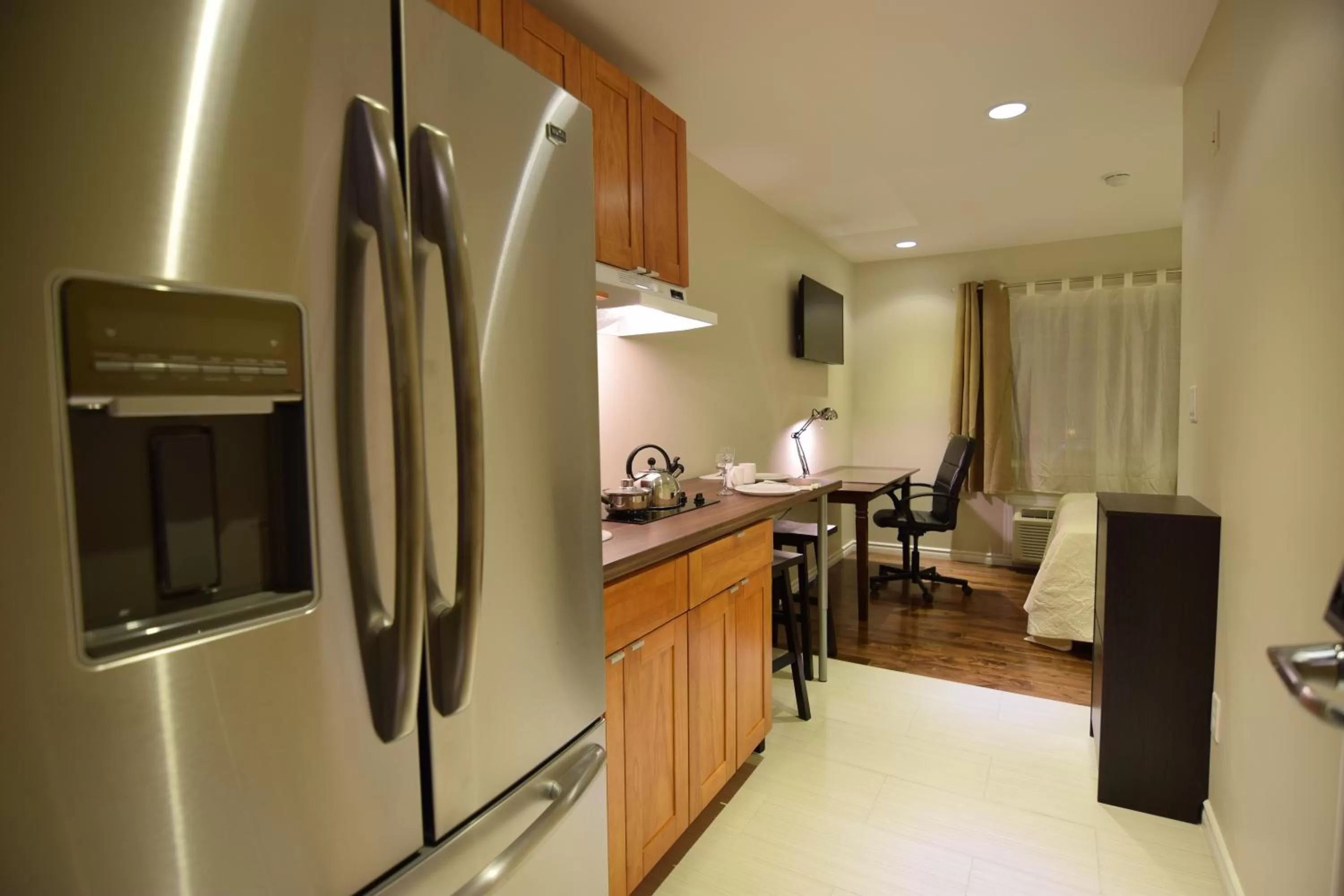 Kitchen or kitchenette in The Lion Inn & Suites