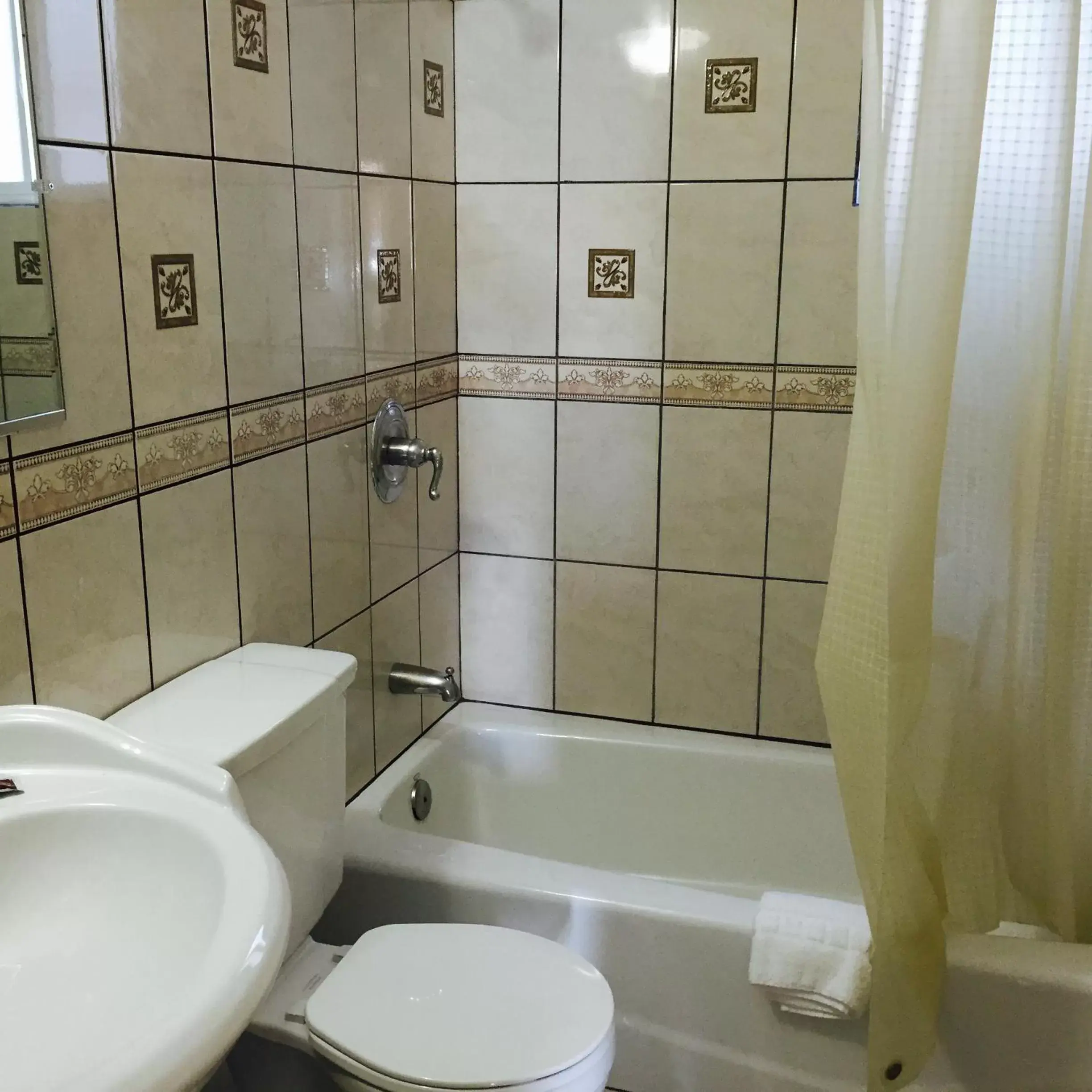Toilet, Bathroom in Hacienda Motel