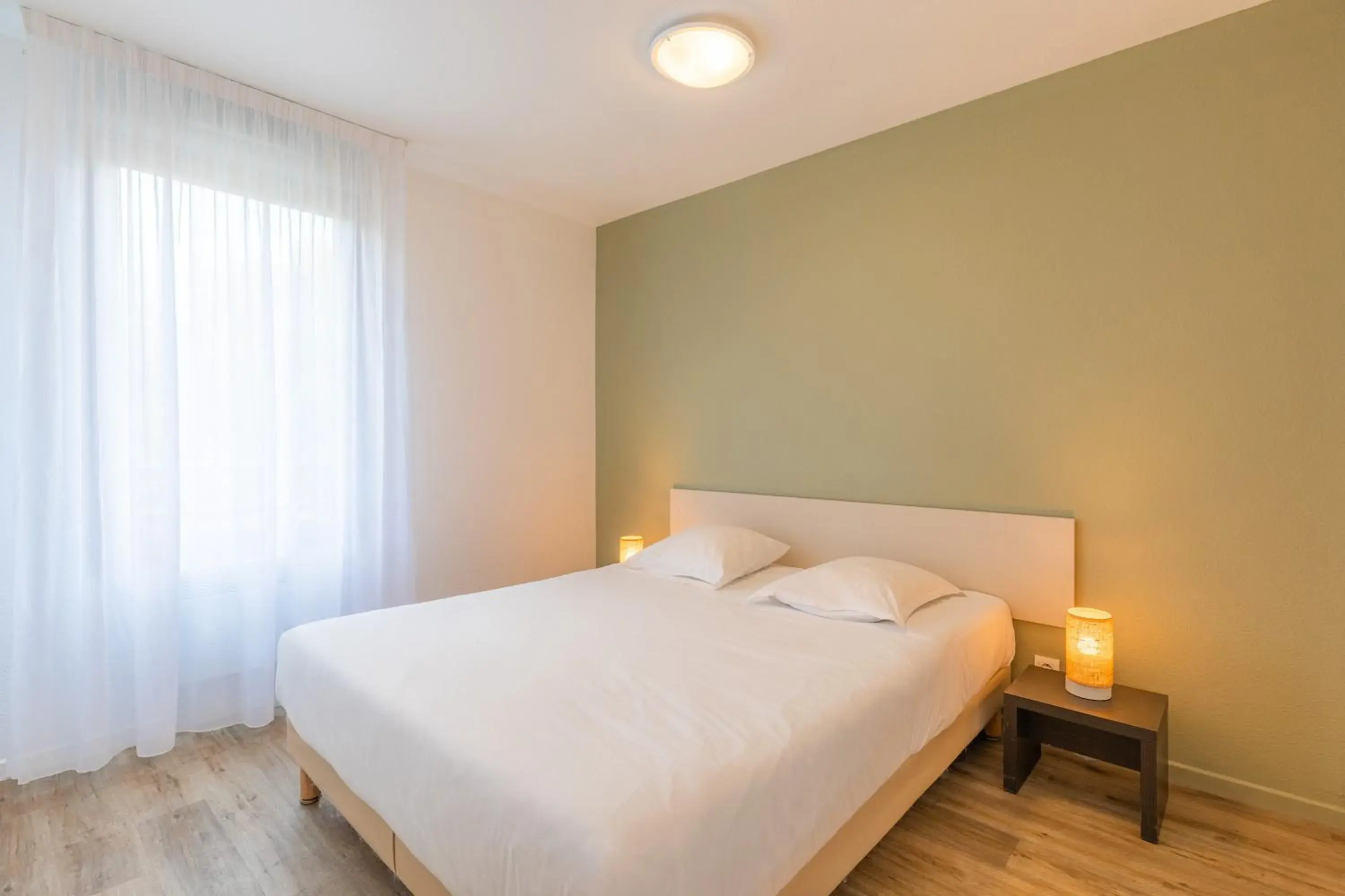 Bed in Appart'City Bourg en Bresse (Ex Park&Suites)