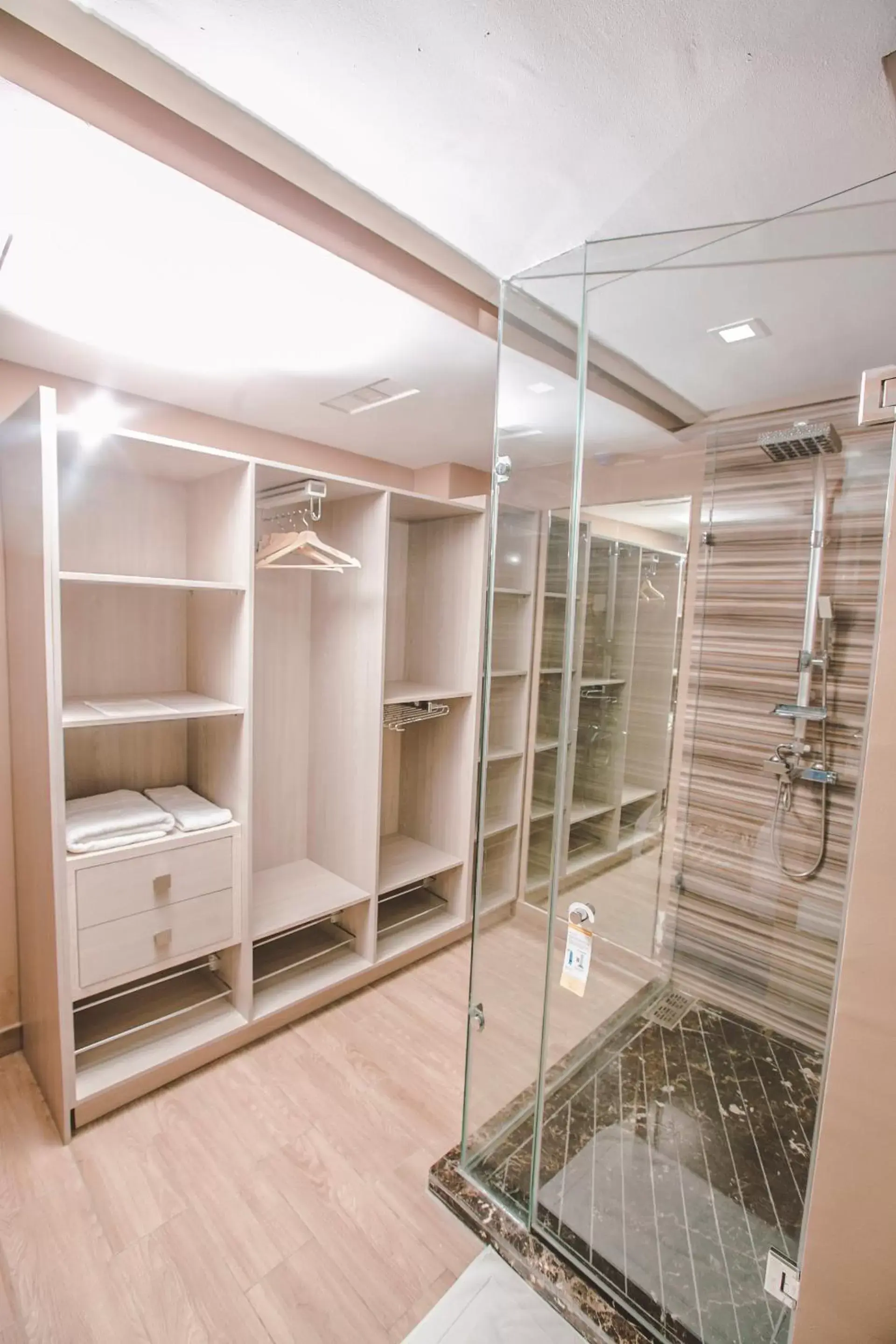 Shower, Bunk Bed in Down Town Hotel By Business & Leisure Hotels