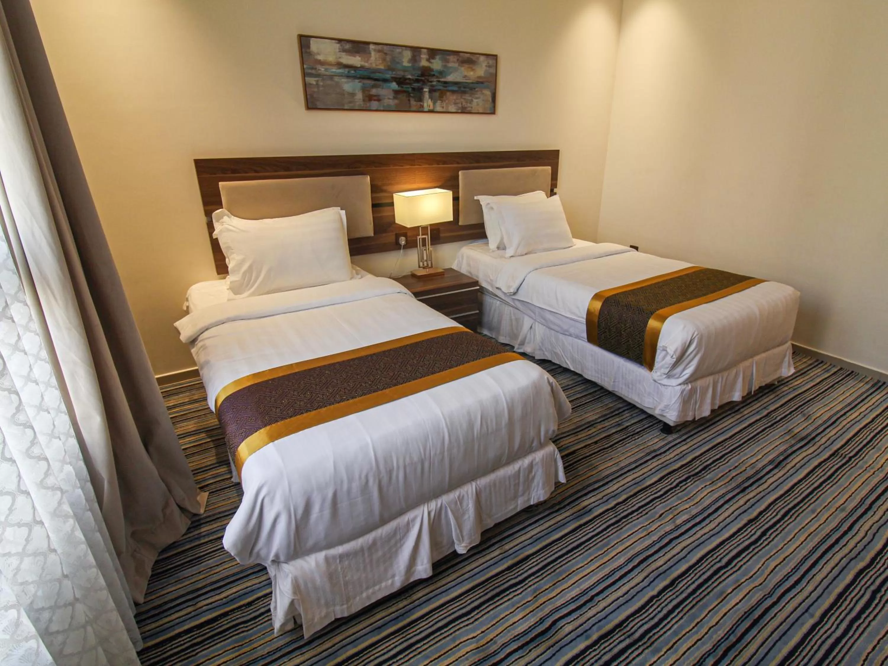 Bed in Friesian Hotel Suites