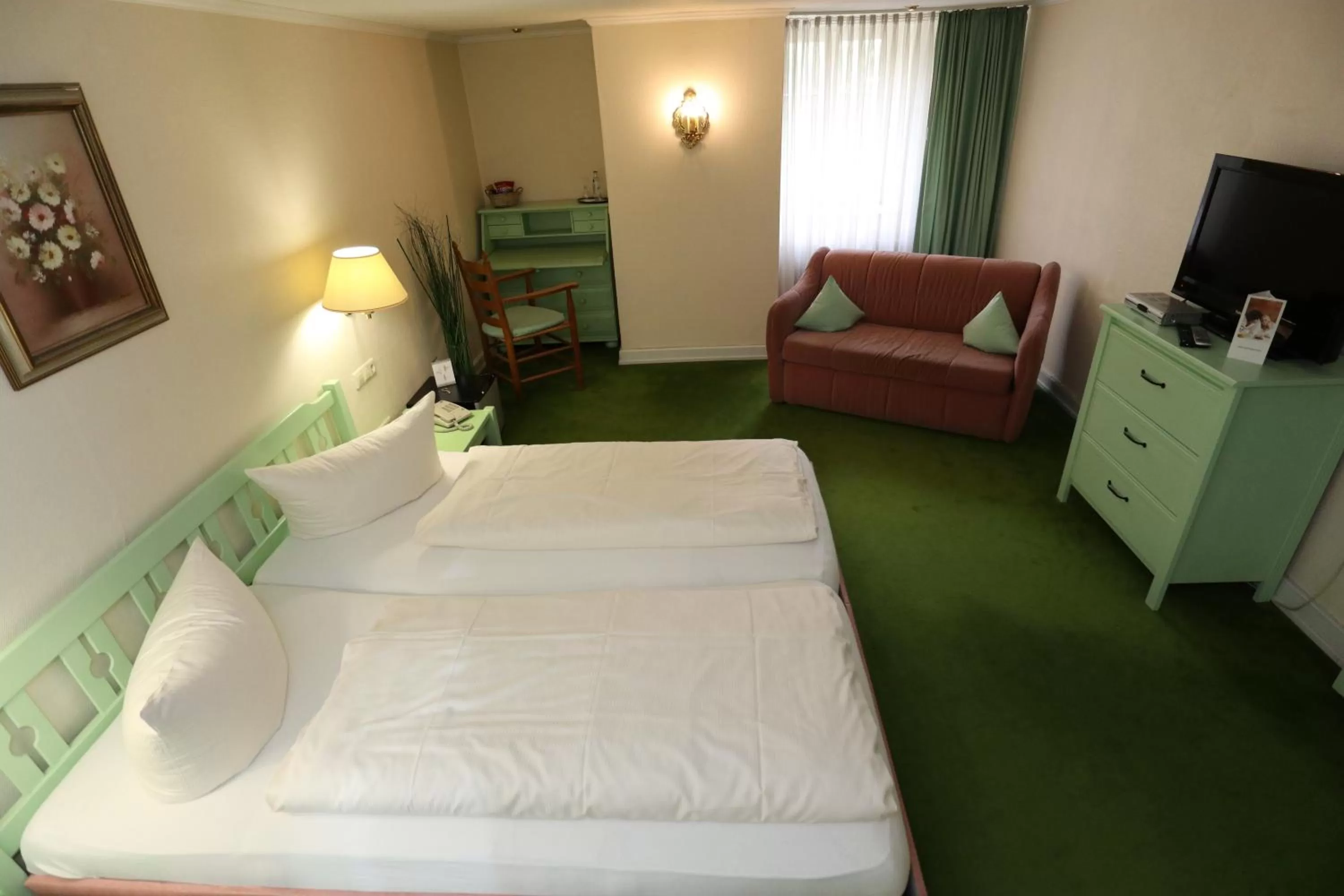 Bed in Schwarzwaldhotel Stollen