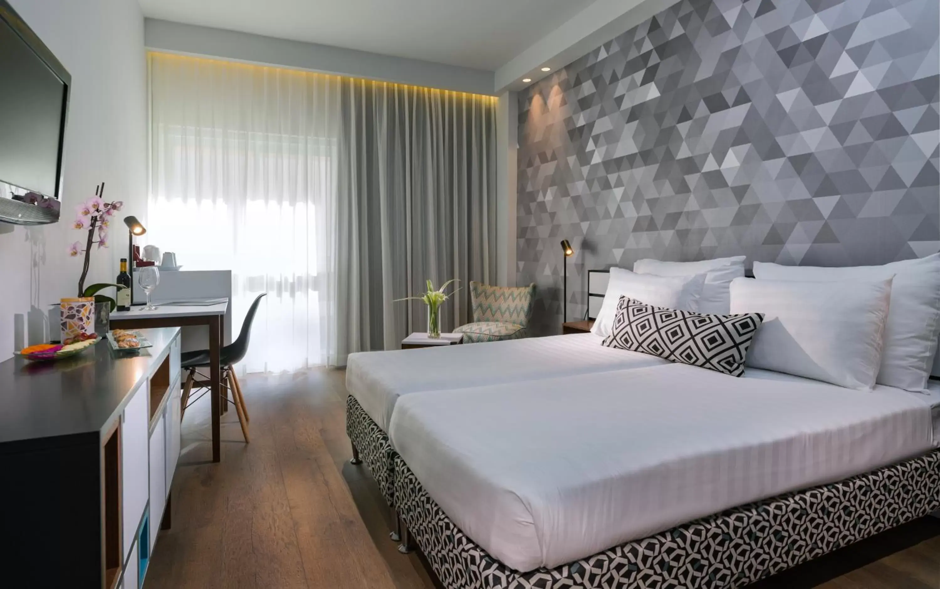 Bedroom, Bed in Prima Tel Aviv Hotel