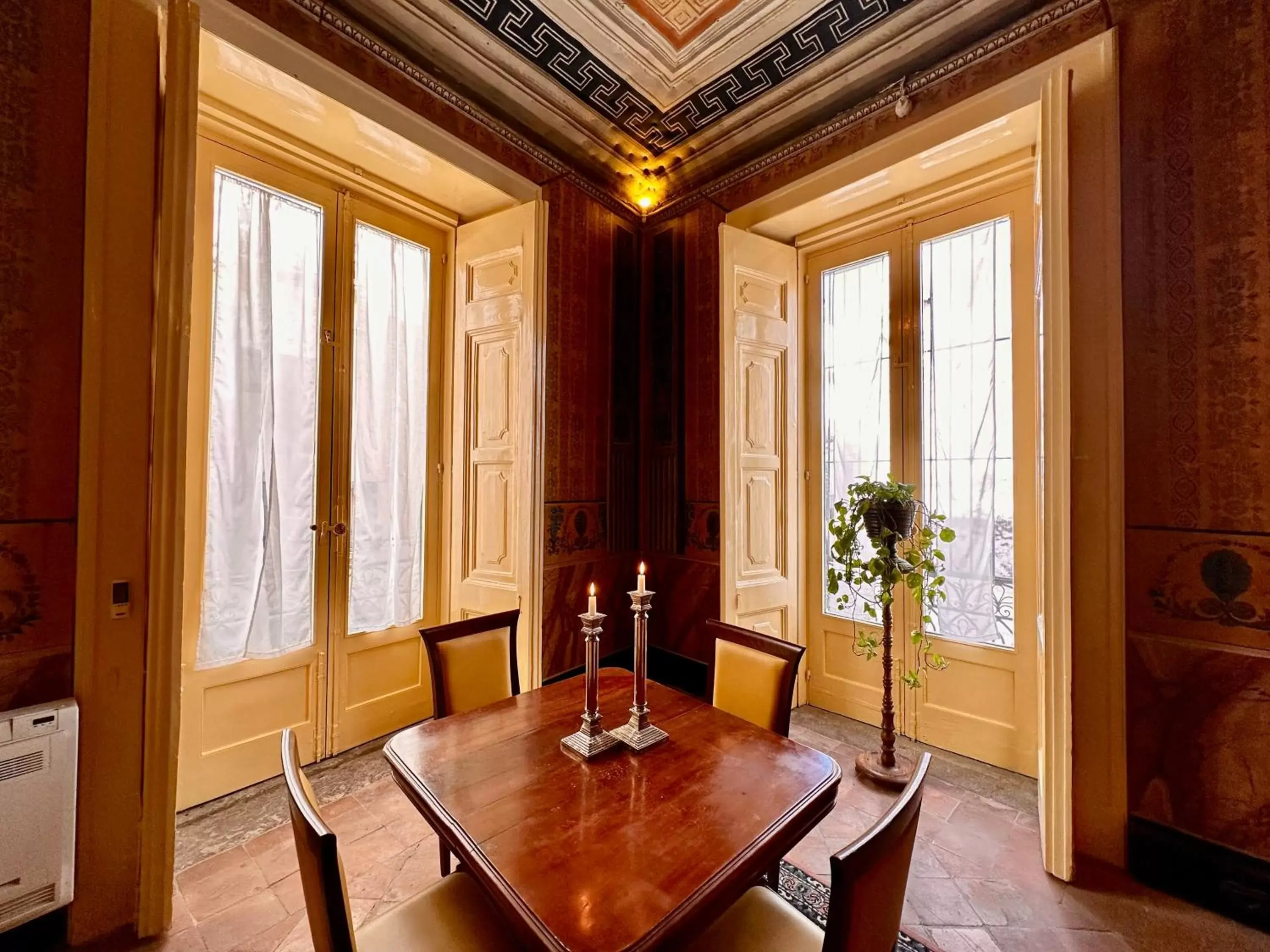 Bedroom, Dining Area in Casa Santangelo Suites