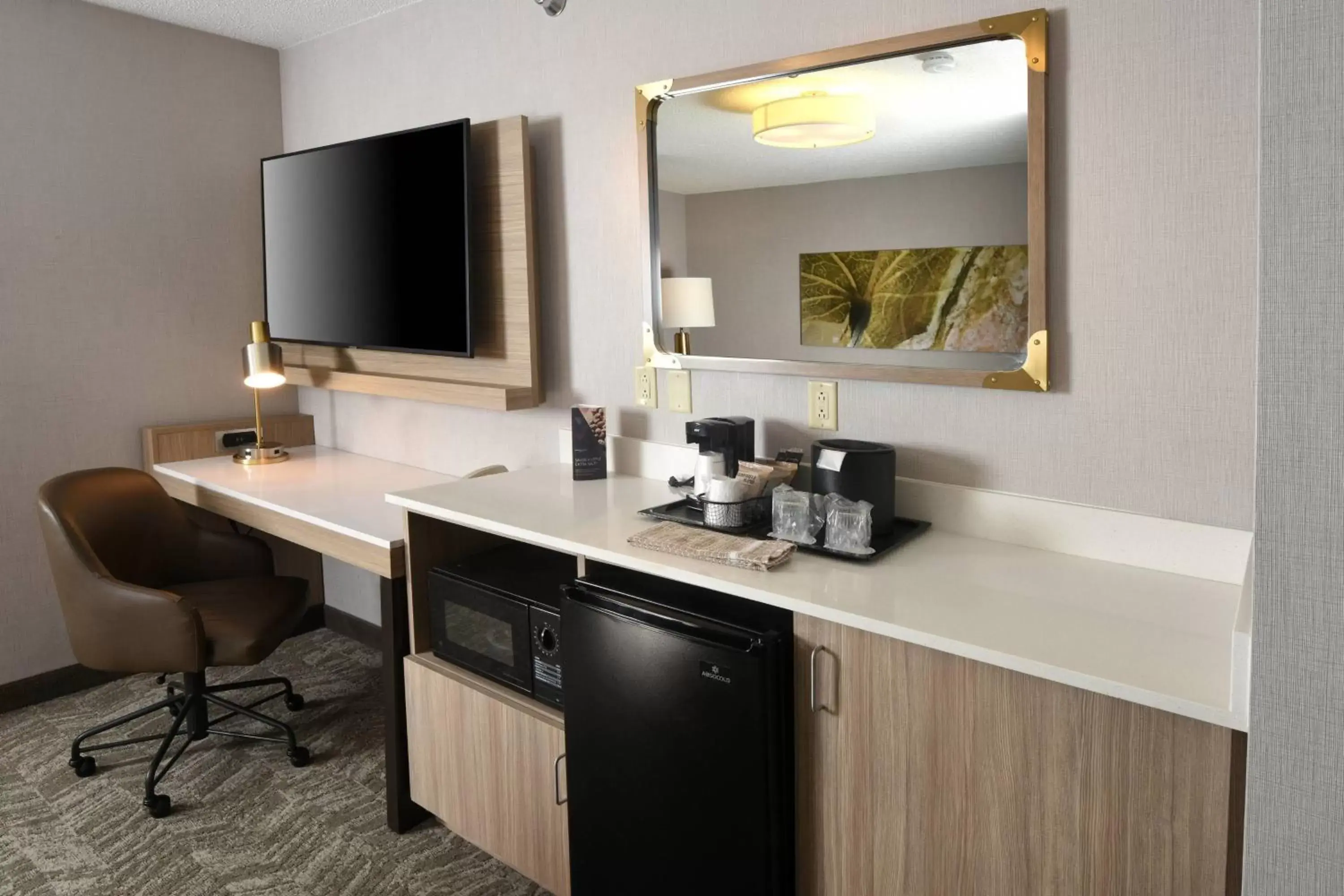 Photo of the whole room, TV/Entertainment Center in SpringHill Suites Des Moines West