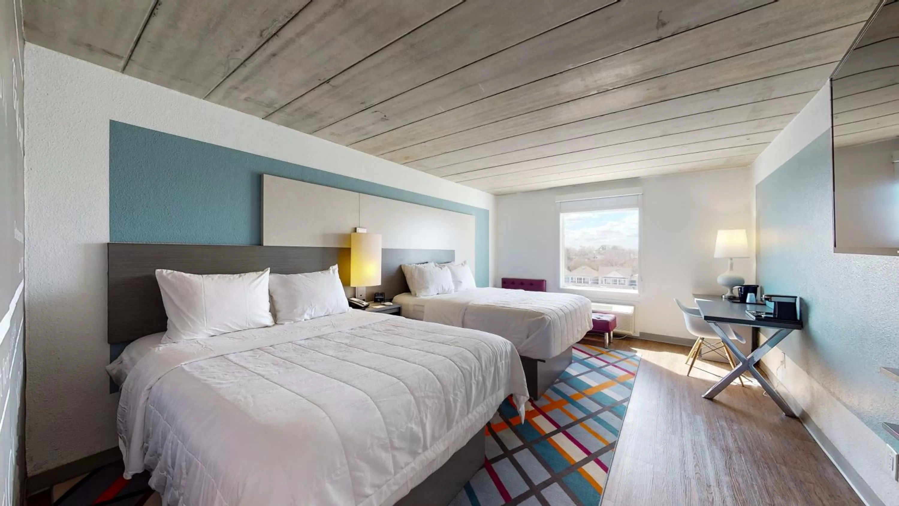 Photo of the whole room, Bed in voco College Station Aggieland by IHG