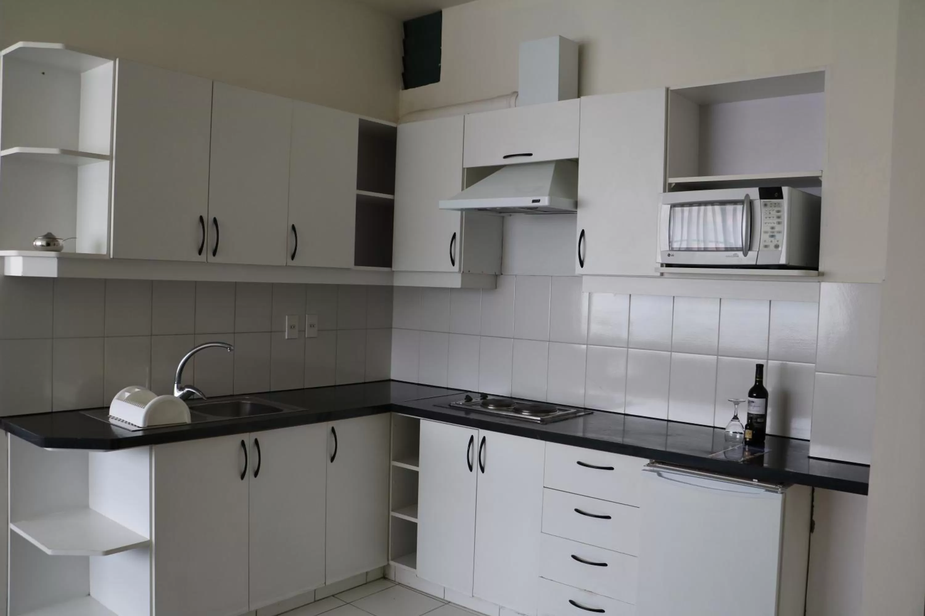 Kitchen or kitchenette in Delfines Apart Hotel