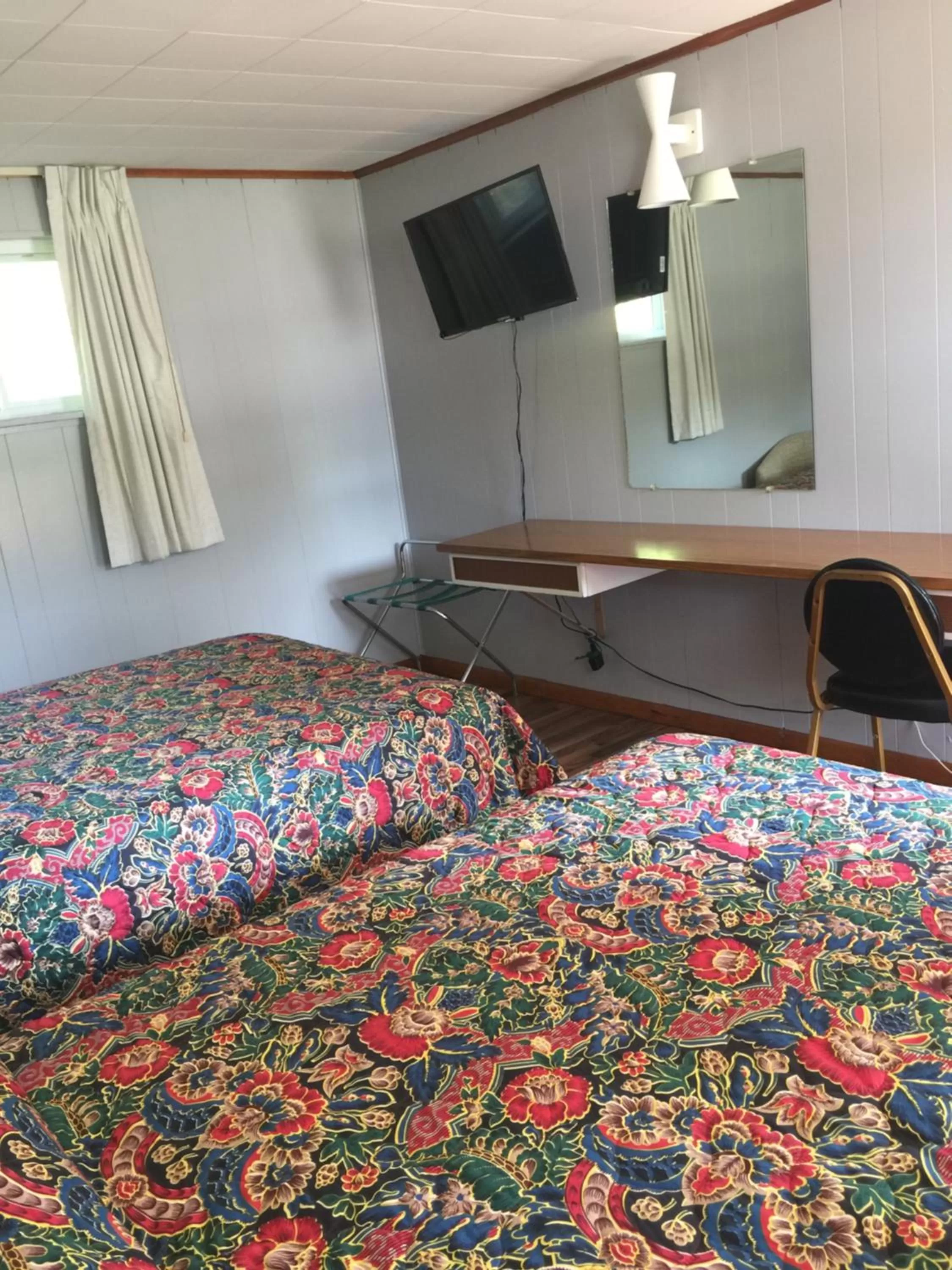 Bed in Melody Motor Lodge