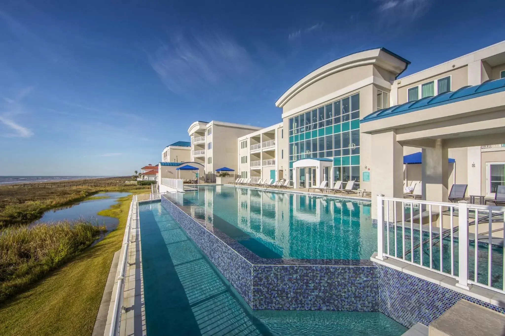 Property building, Swimming Pool in Holiday Inn Club Vacations Galveston Seaside Resort, an IHG Hotel