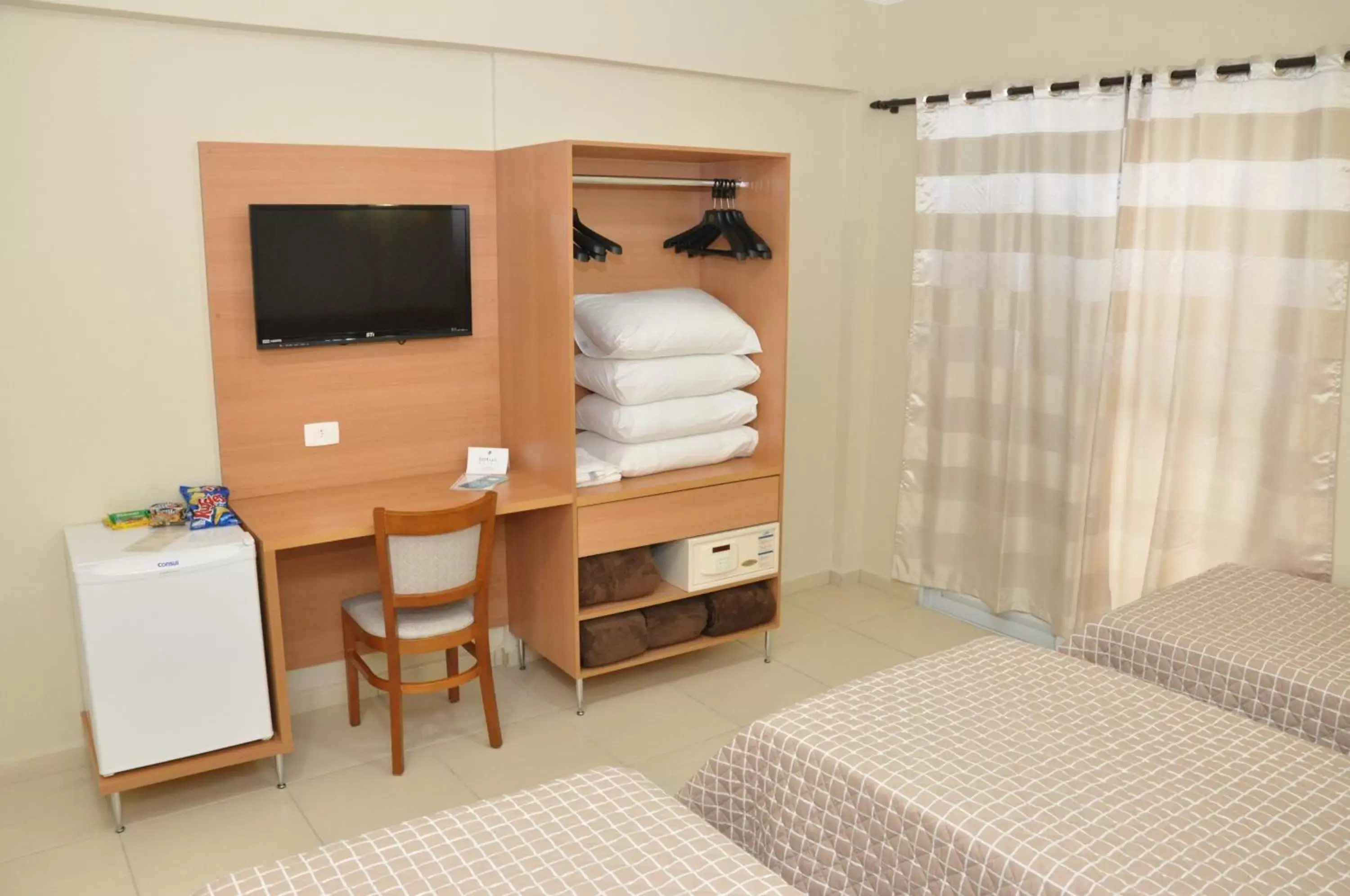 Standard Quadruple Room in Lotus Hotel - à 6 km do Santuário de Aparecida-SP Standard Quadruple Room in Lotus Hotel - à 6 km do Santuário de Aparecida-SP