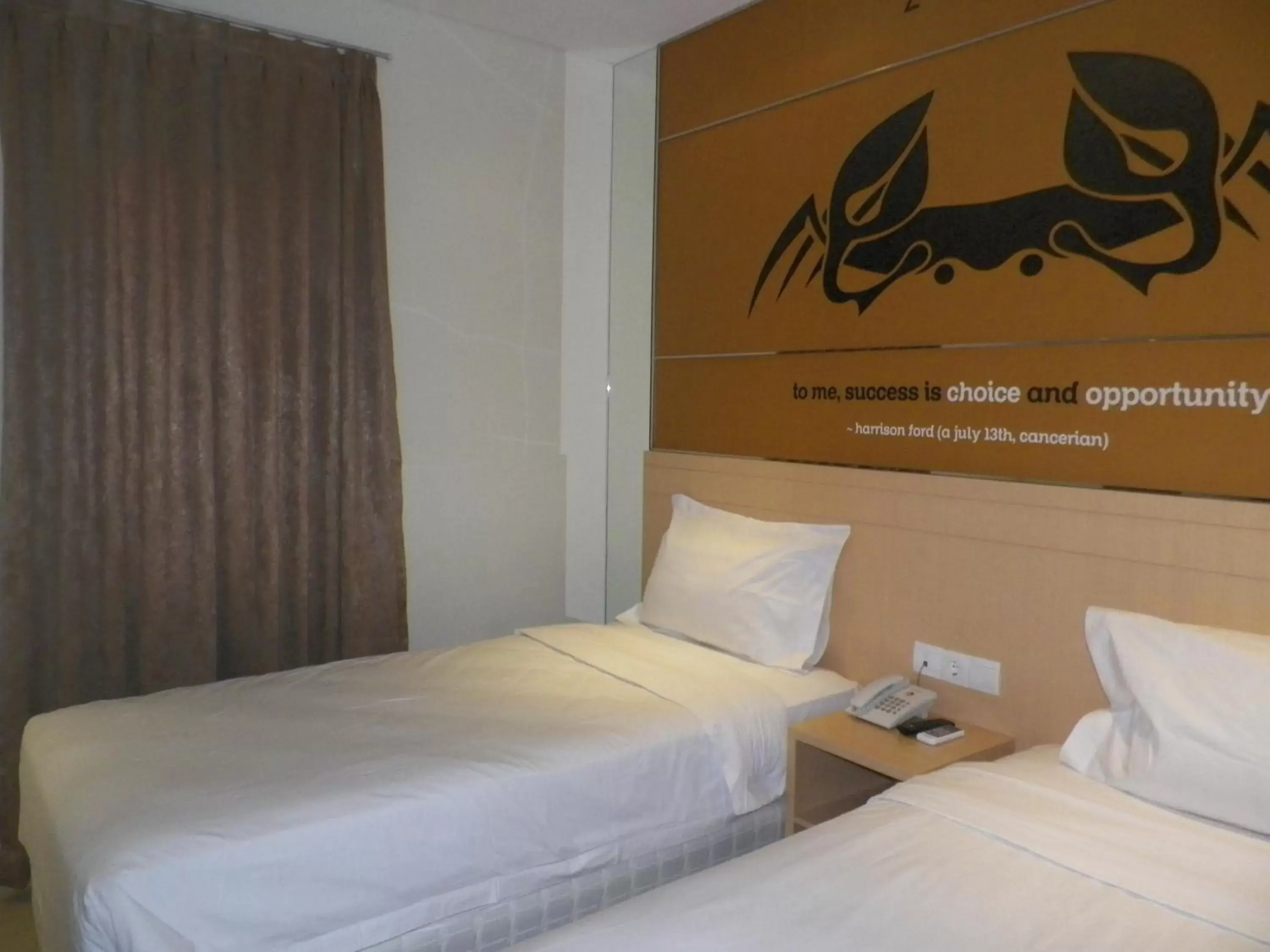 Bed in Zodiak Asia Afrika by KAGUM Hotels