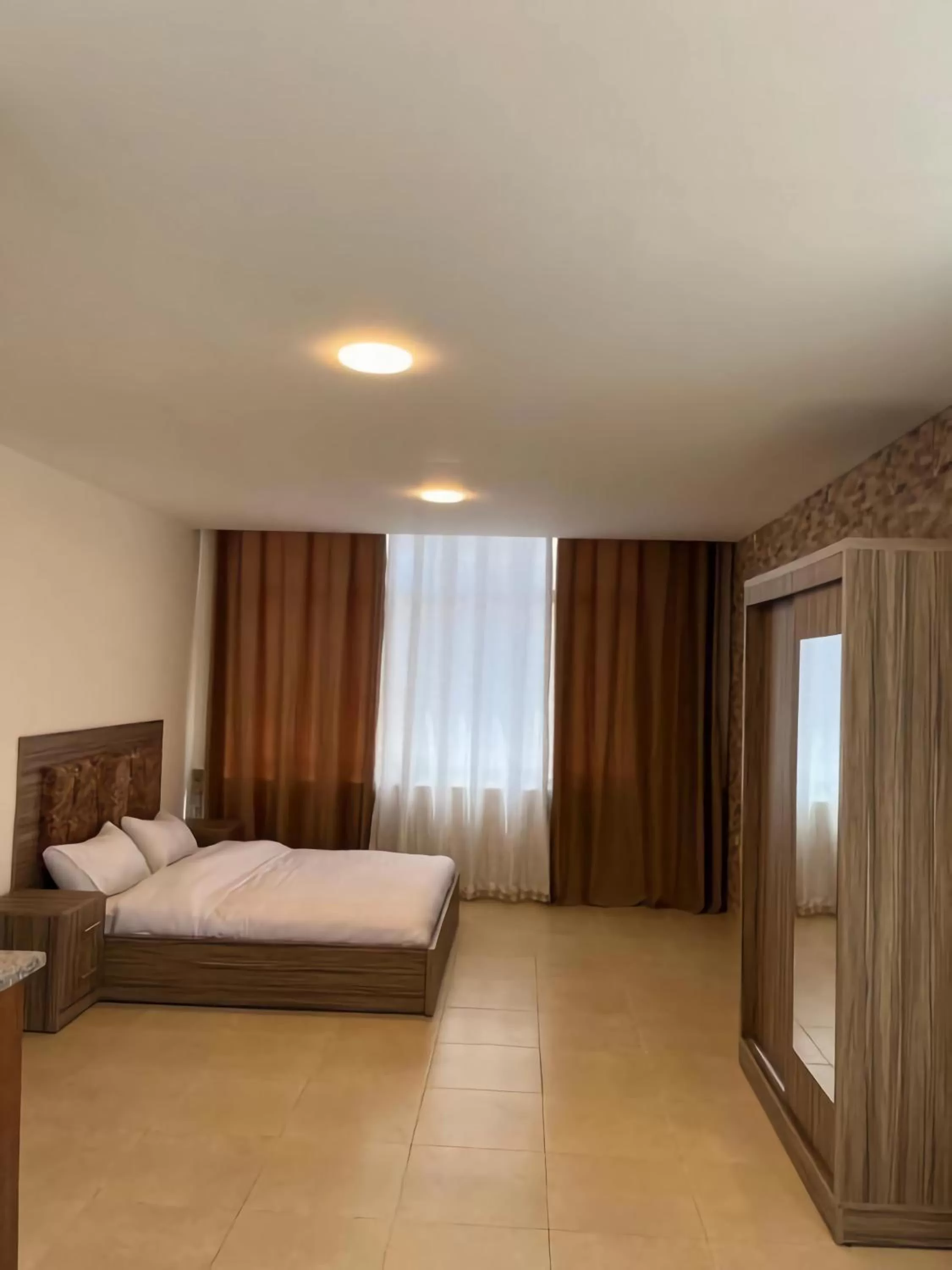 Photo of the whole room, Bed in Rayan Hotel Suites