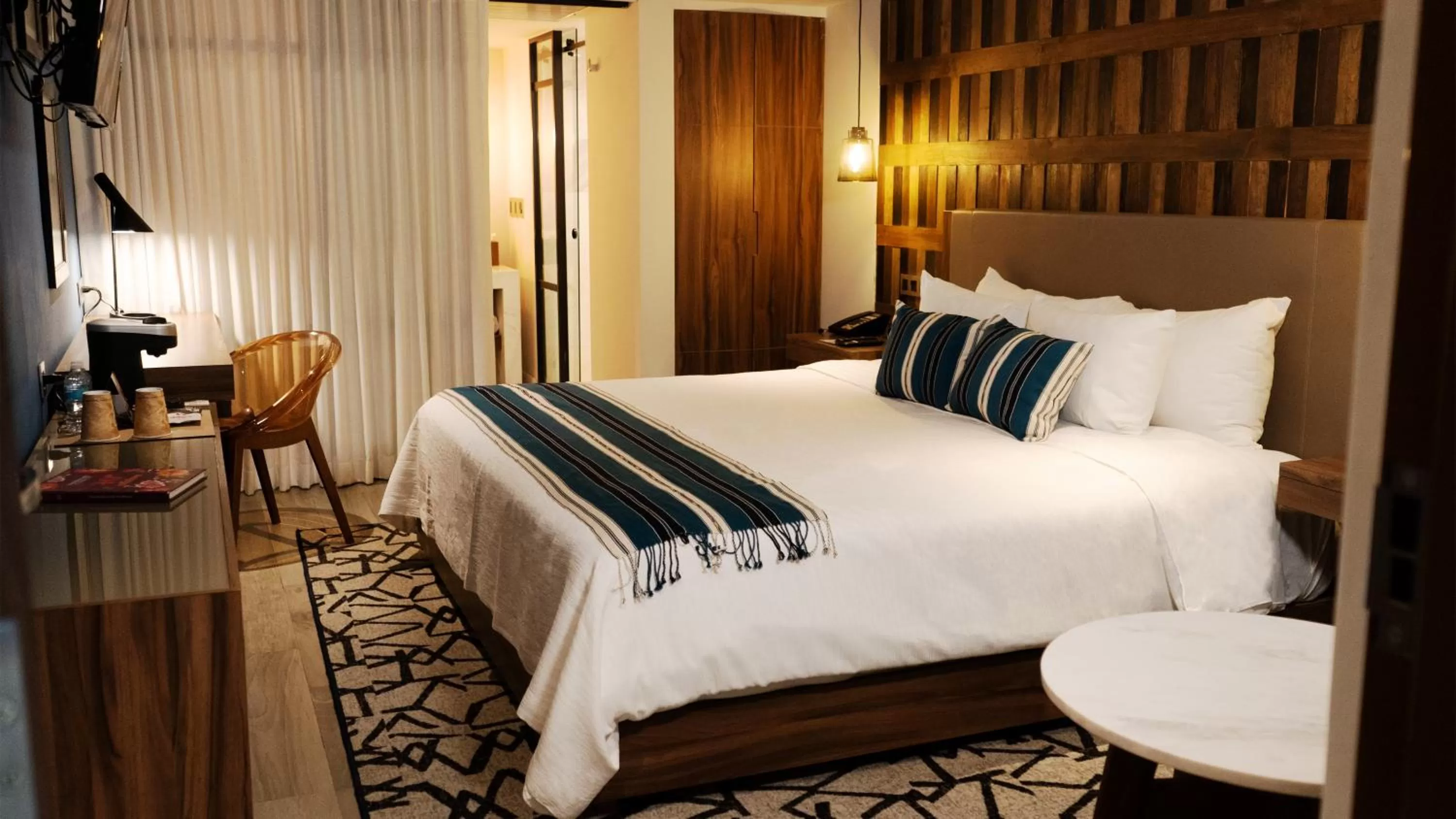 Bed in Hotel Indigo Guadalajara Expo by IHG