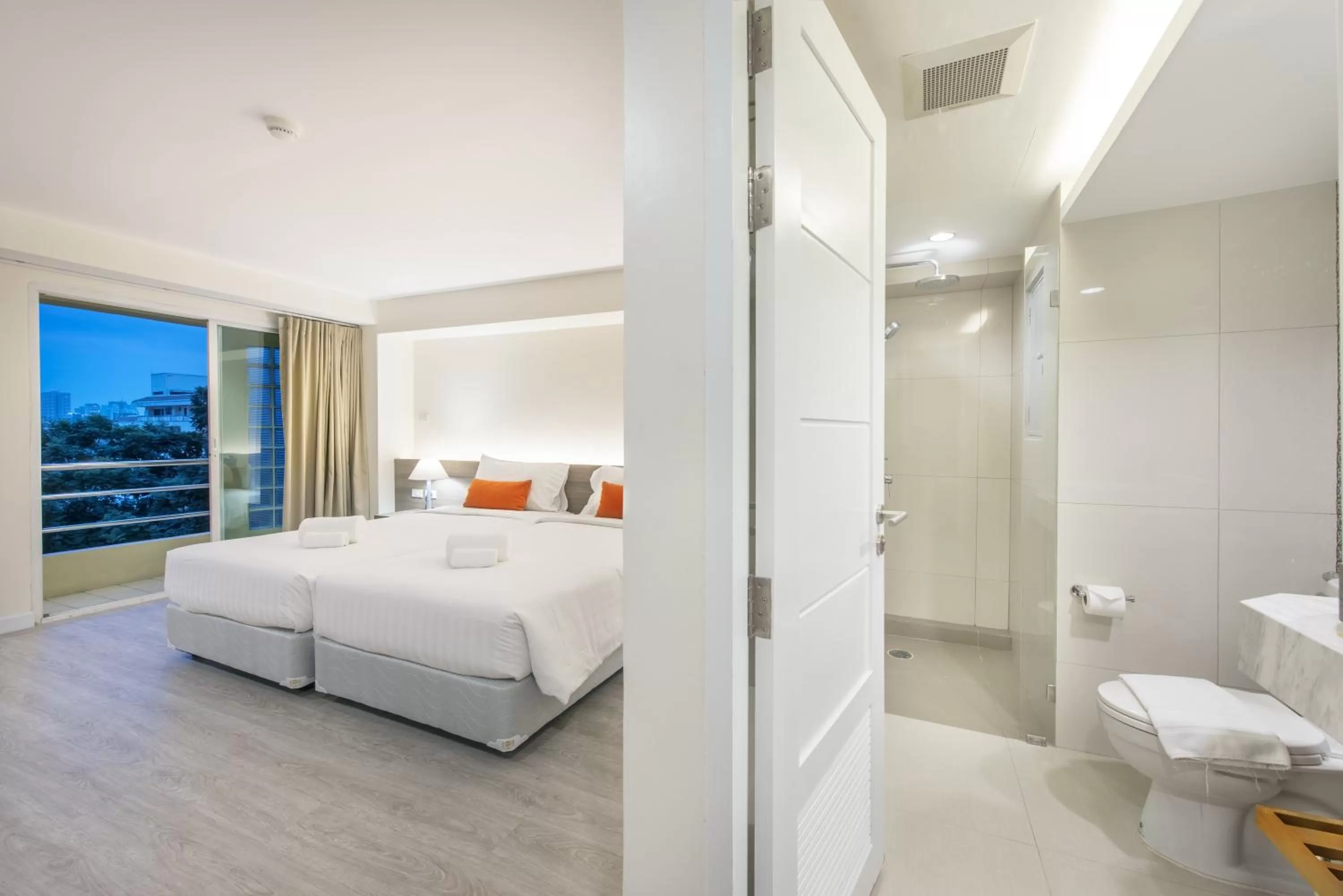 Toilet, Bed in Le Tada Residence