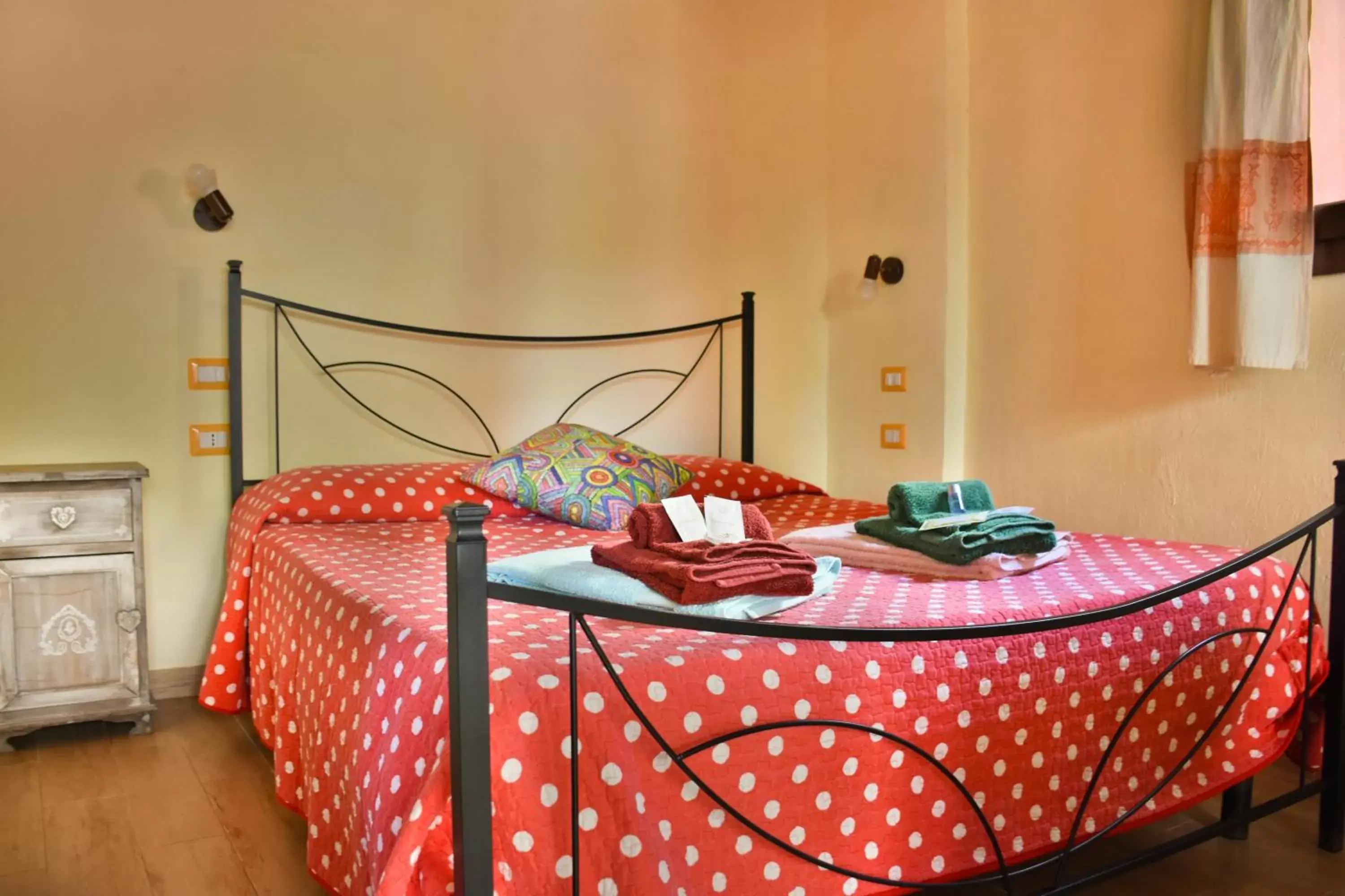Bed in Flowery Inn Villa