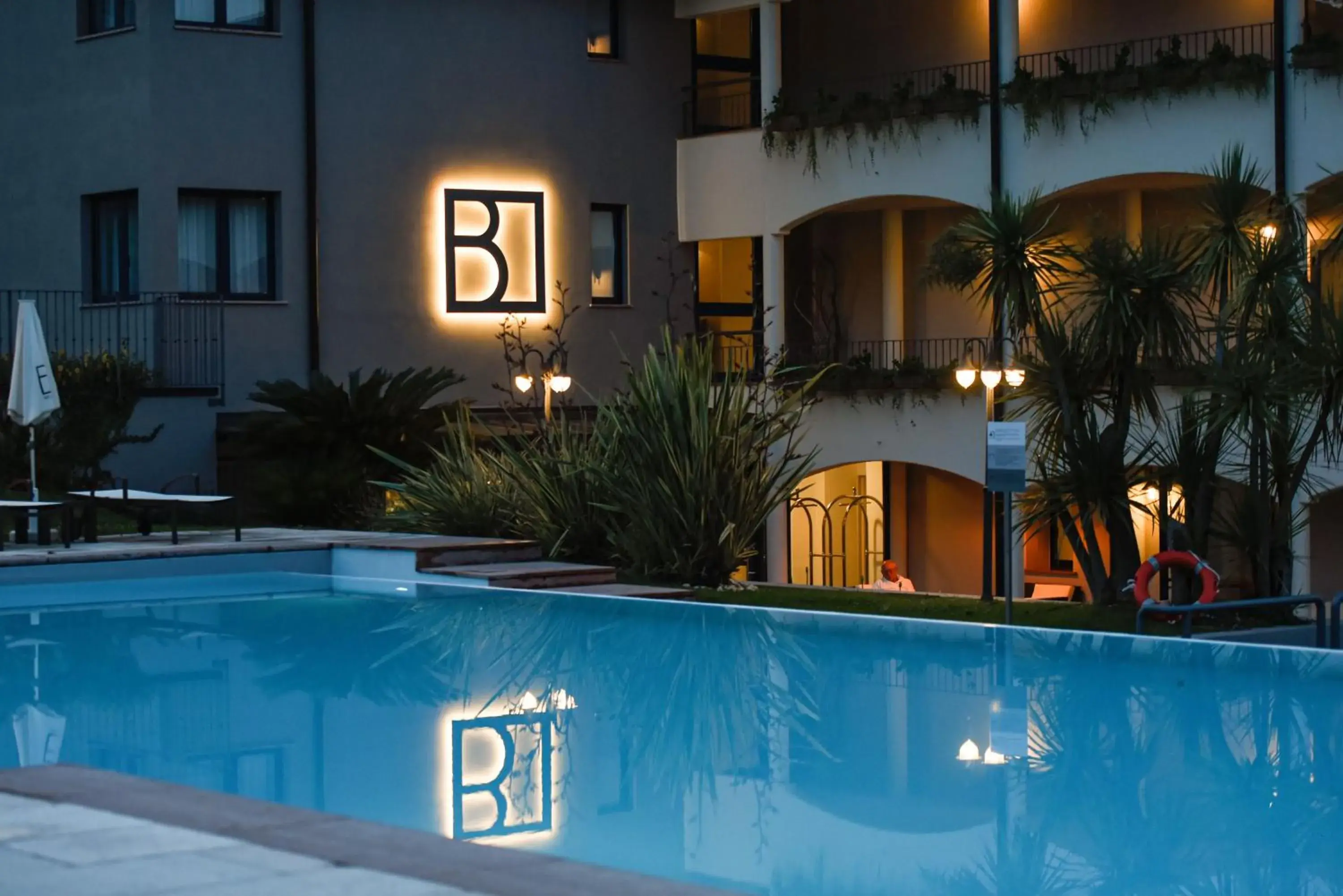 Property building, Swimming Pool in Bella Hotel & Restaurant