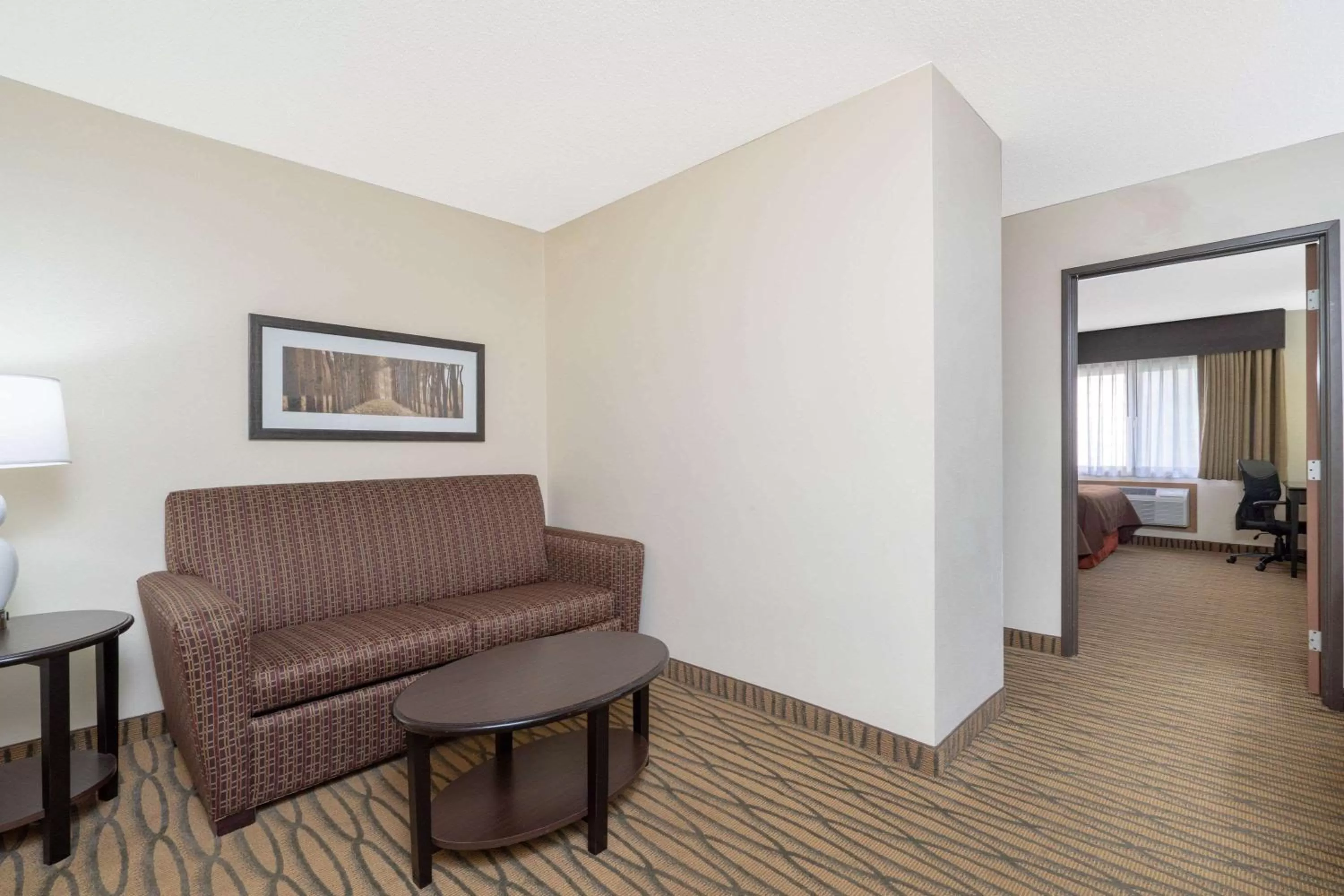Living room, Seating Area in AmericInn by Wyndham Rogers