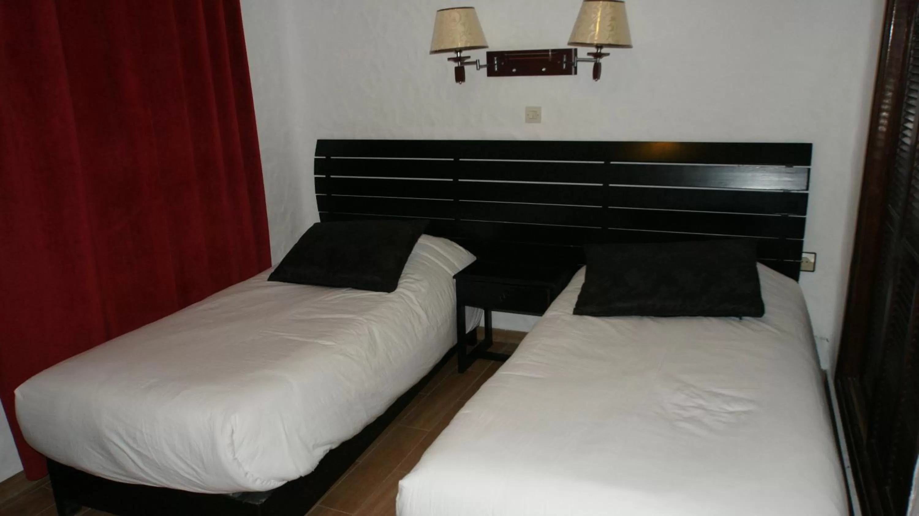 Bed in Hotel Hacienda