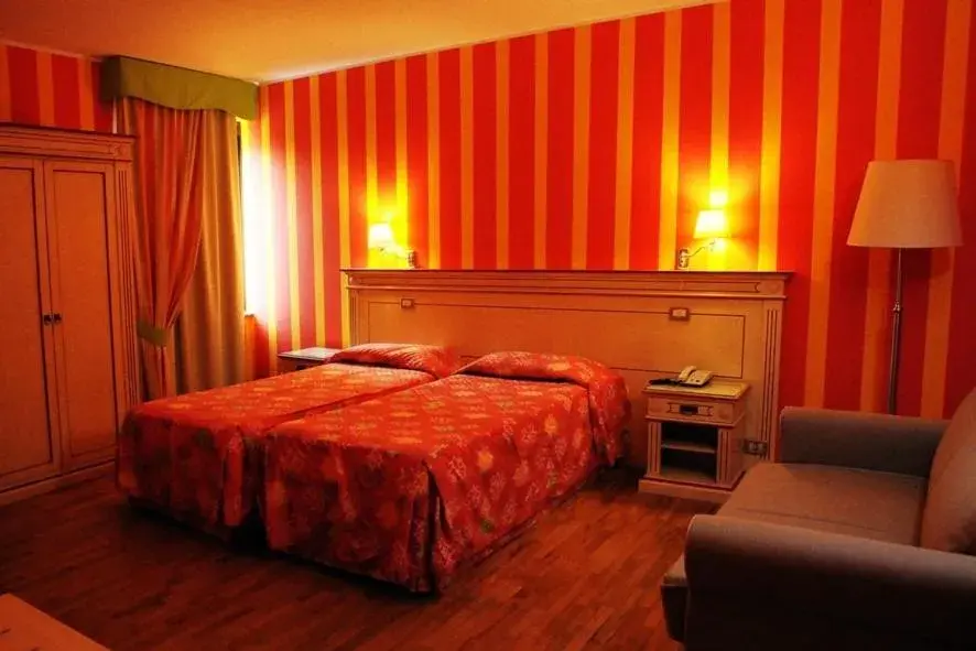 Photo of the whole room, Bed in Hotel Matteotti