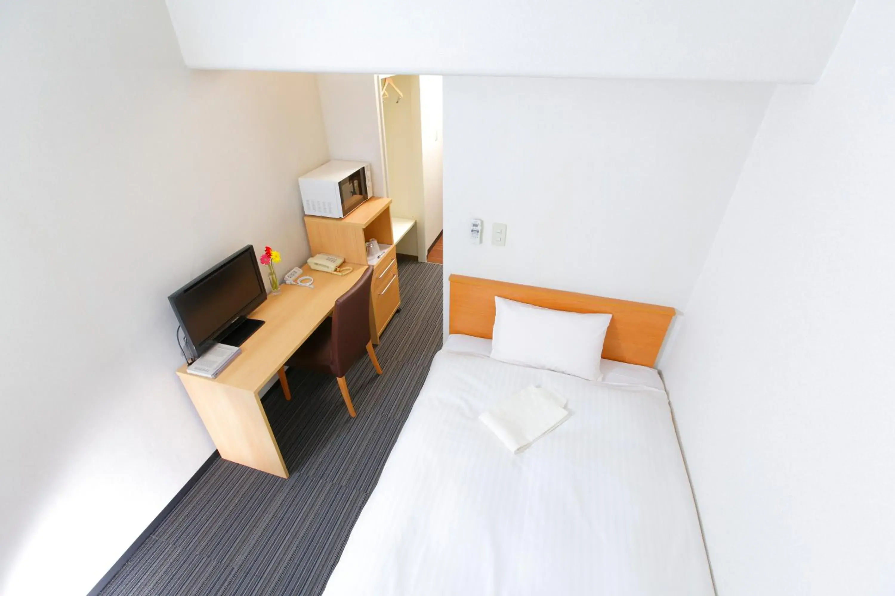 Photo of the whole room, Bed in Flexstay Inn Tokiwadai