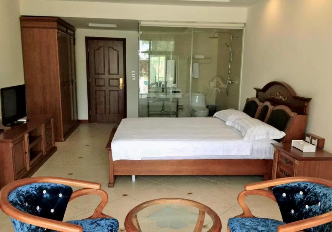 Bed in Victoria Beach Hotel