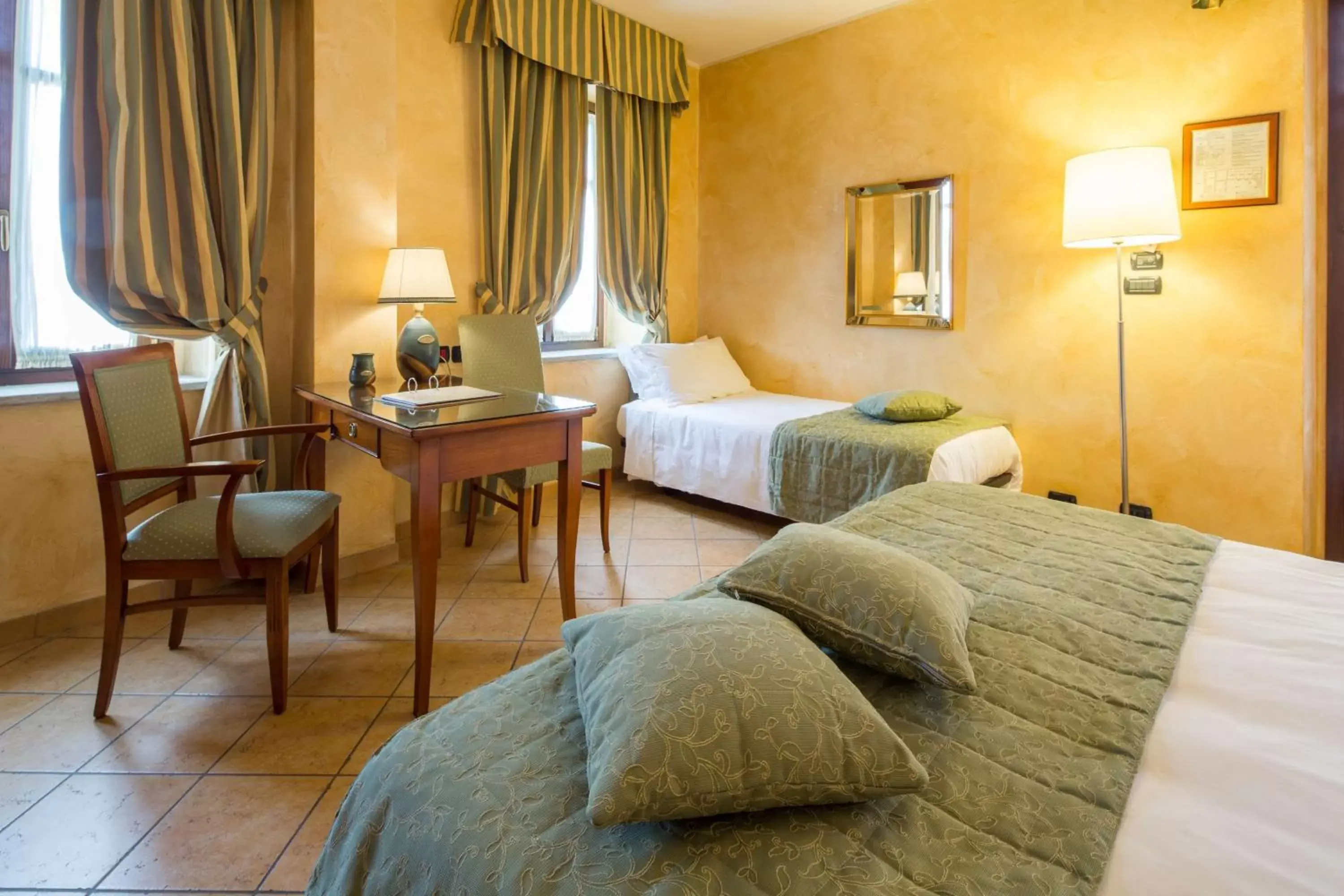 Bedroom in Best Western Plus Hotel Le Rondini