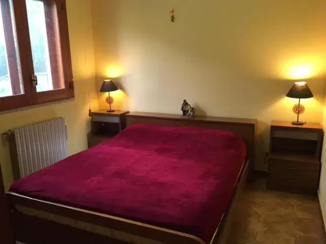 Bed in Stanza in Villa con giardino vista mare