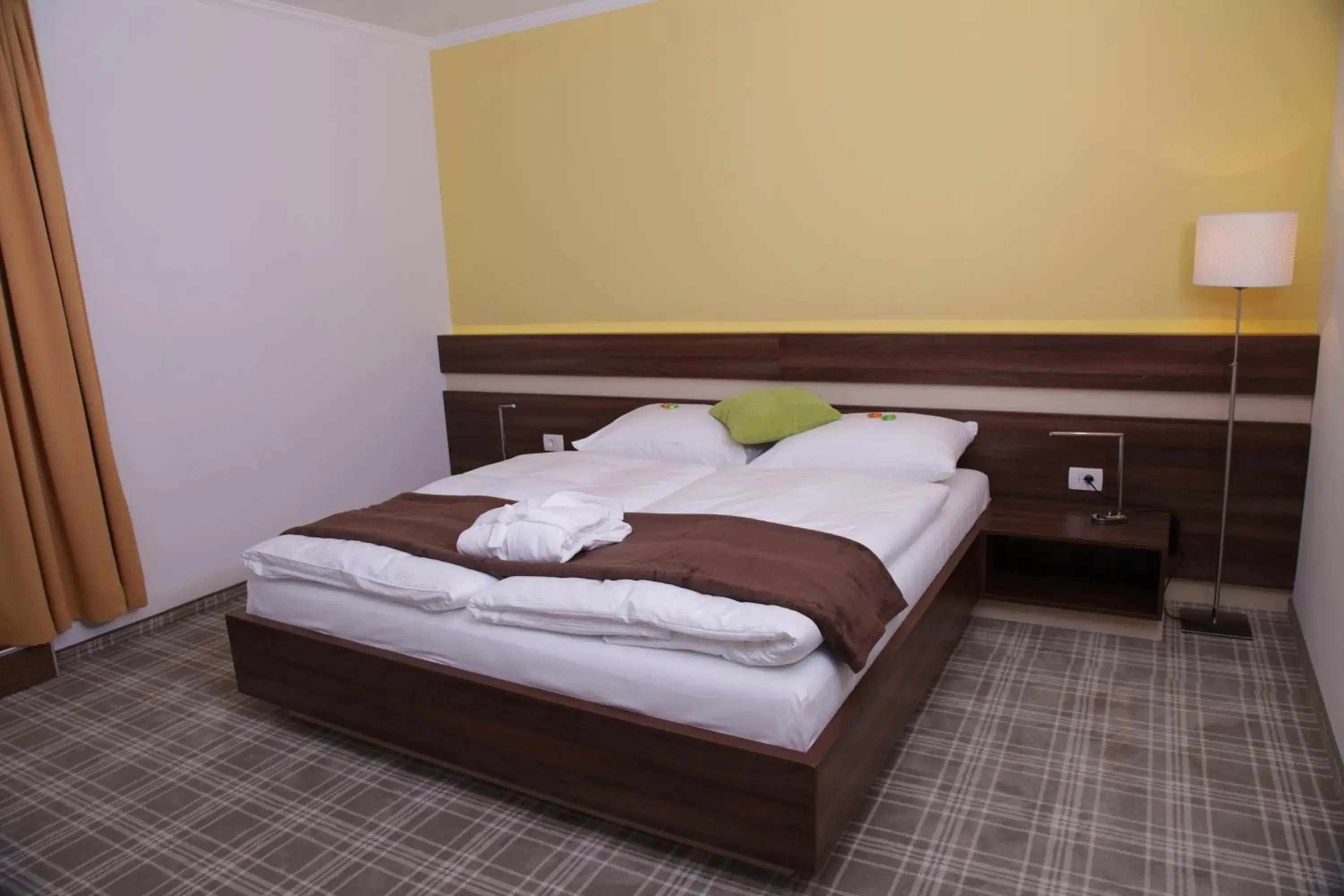 Bed in Primus Hotel & Apartments