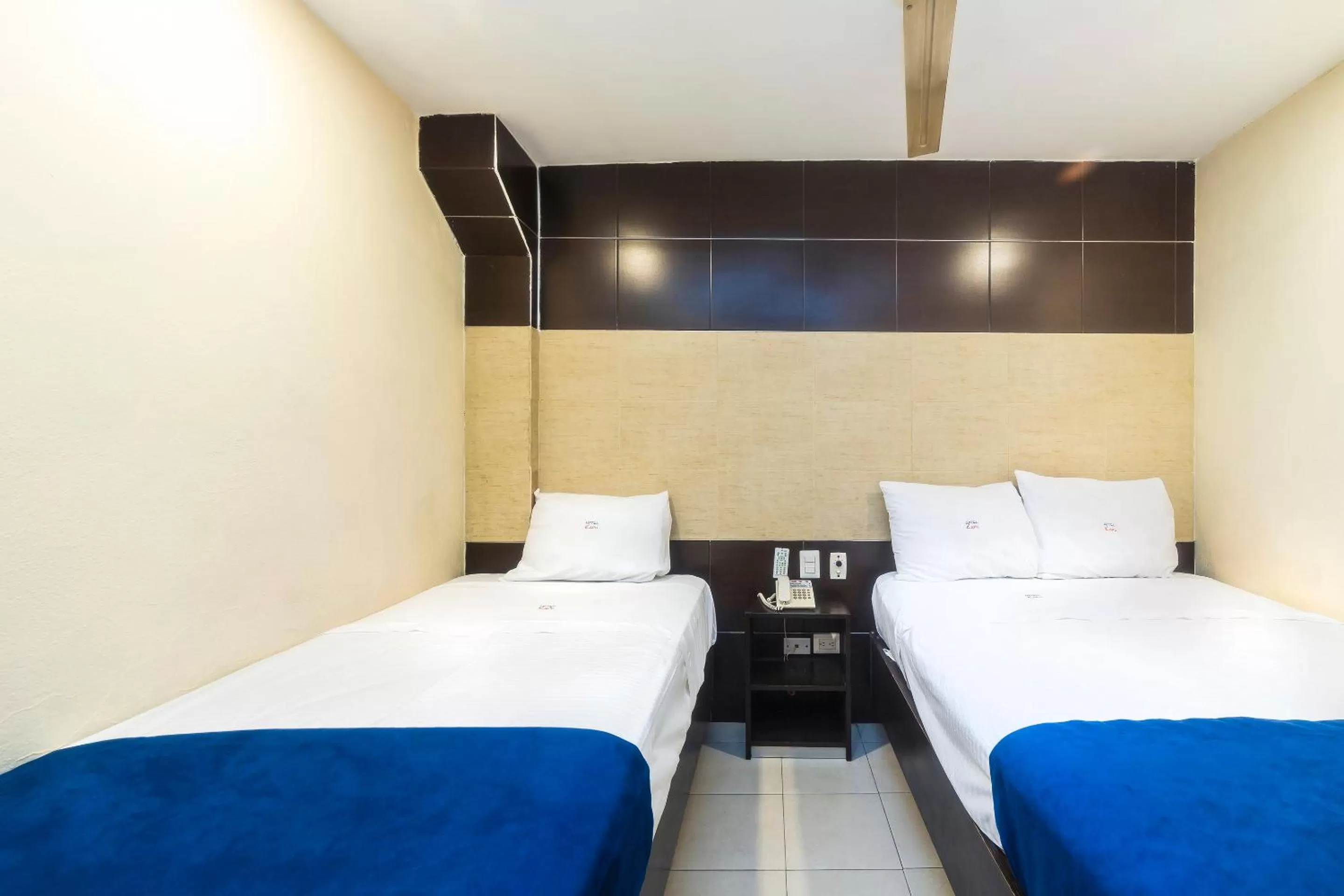 Bed in Hotel Kapu, Puebla