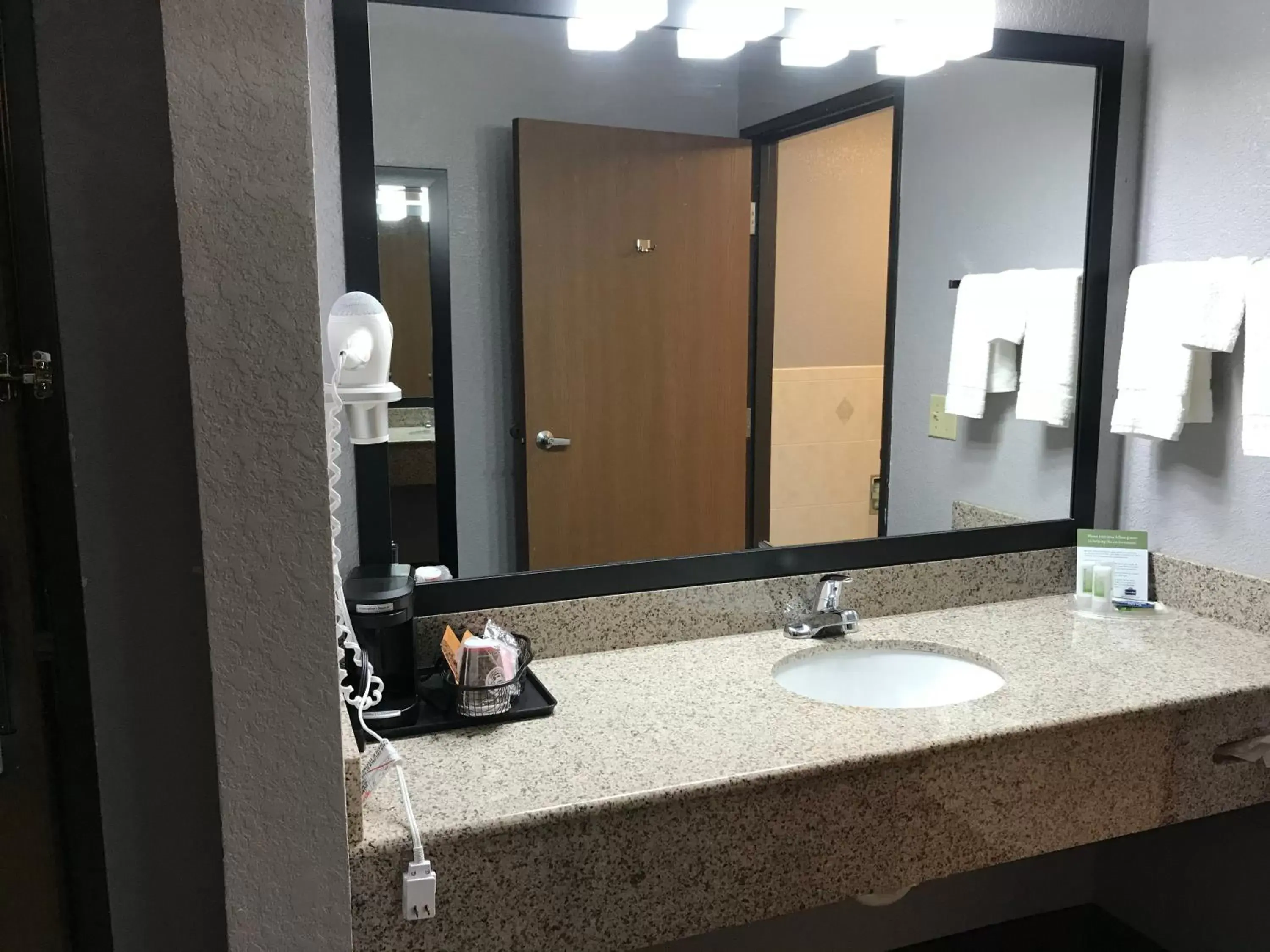 Bathroom in AmericInn by Wyndham Ankeny/Des Moines