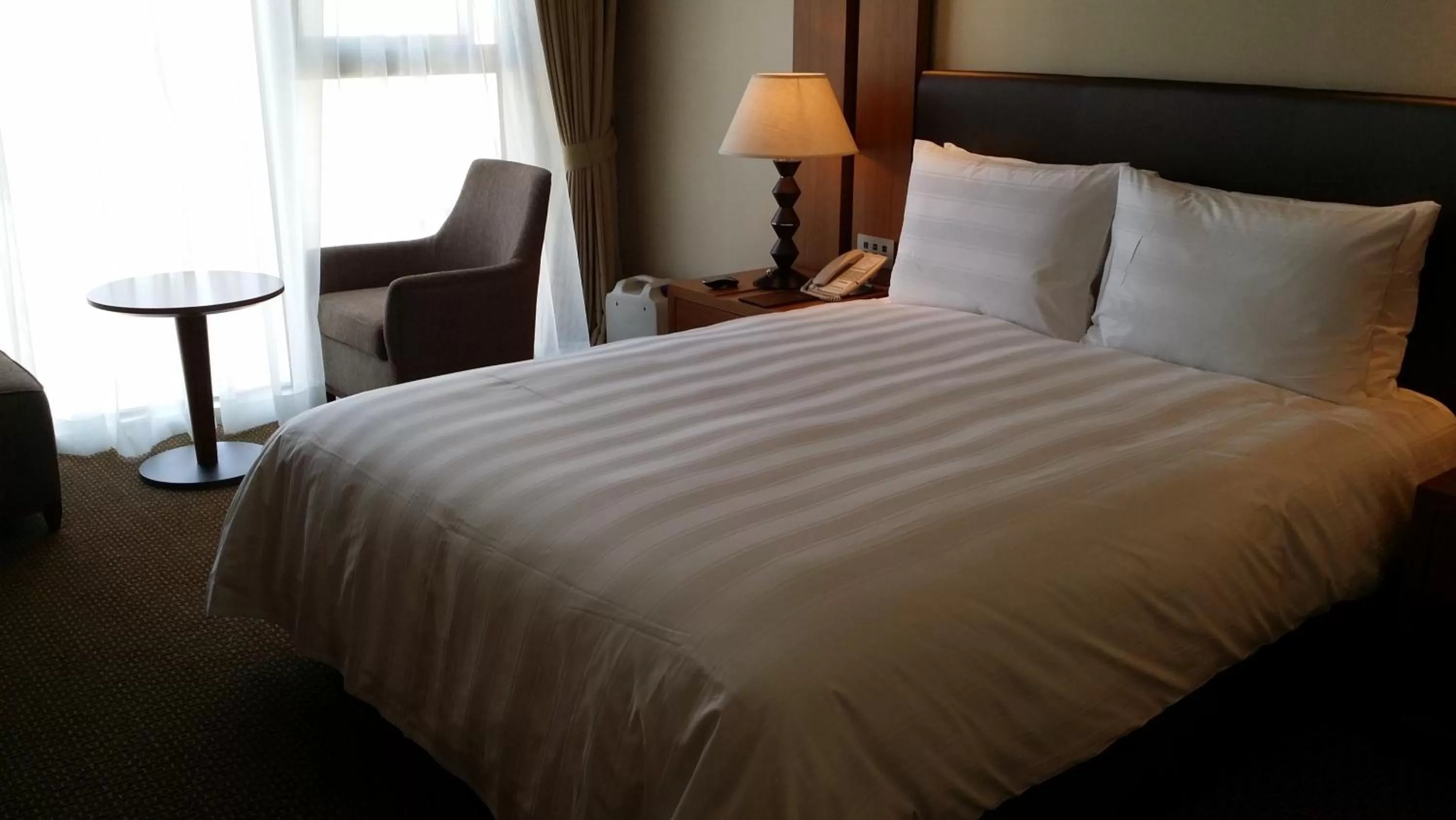 Bed in LOTTE CITY HOTEL Daejeon