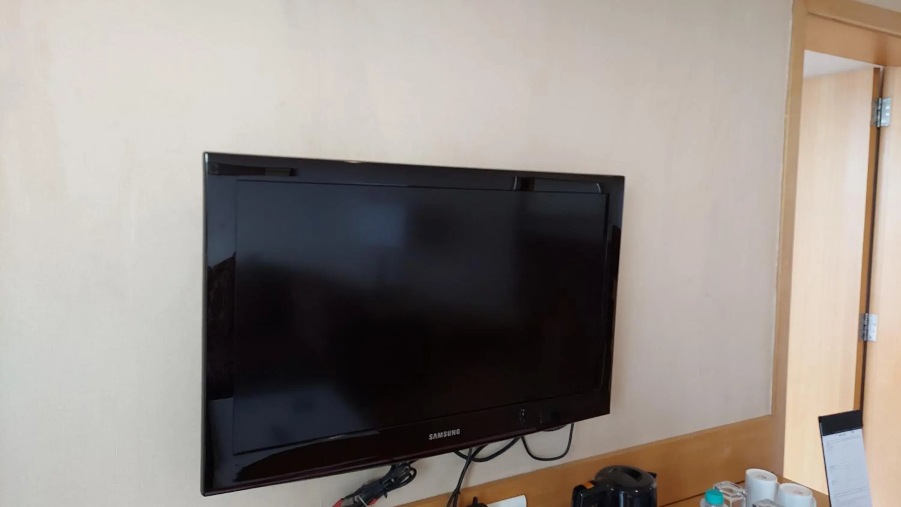 TV and multimedia, TV/Entertainment Center in Country Inn Mysore