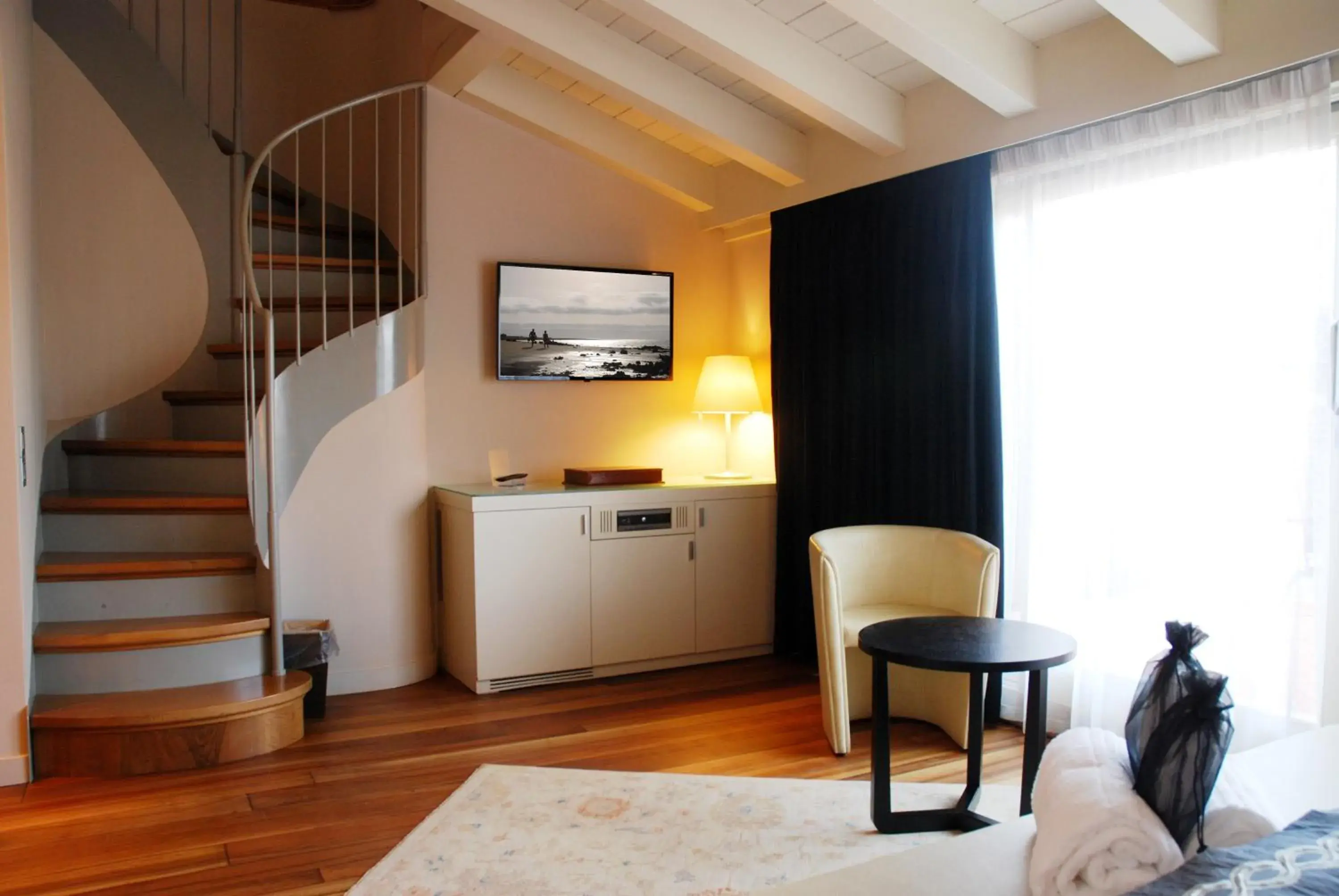 Photo of the whole room, Seating Area in Palazzo Ai Capitani