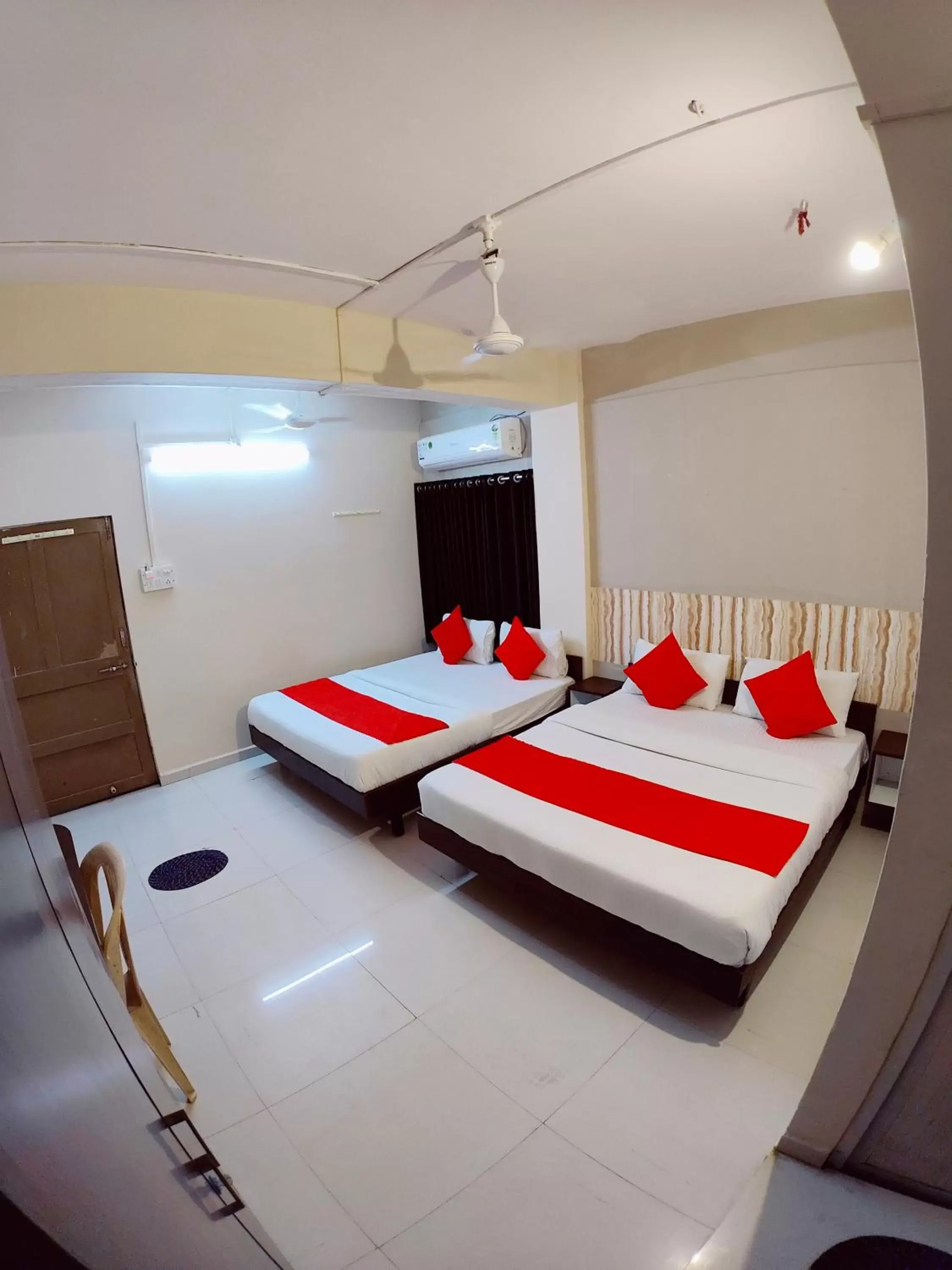Bed in Hotel Nawanagar Residency Bed in Hotel Nawanagar Residency