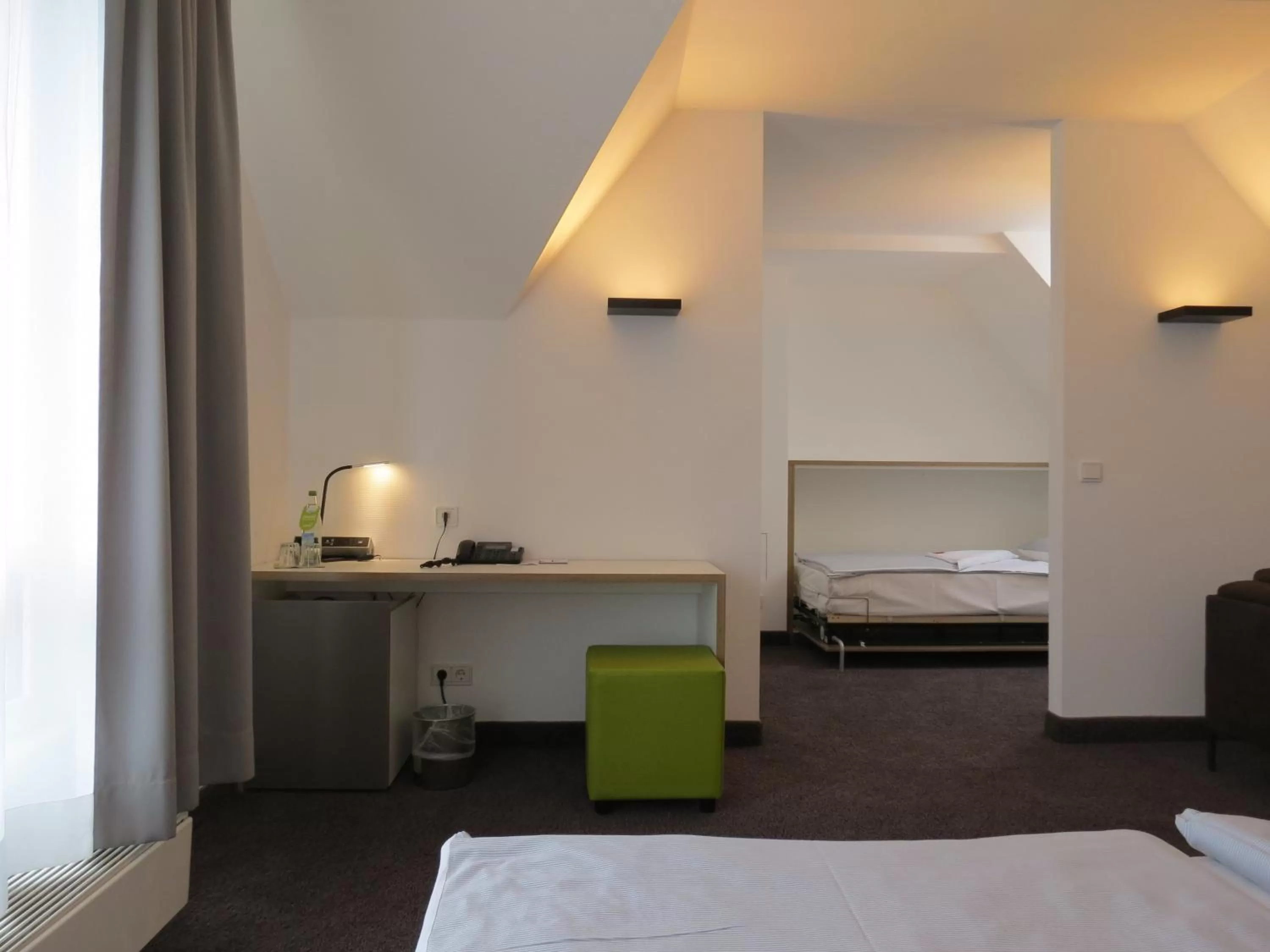 Bed in Comfor Hotel Ulm City